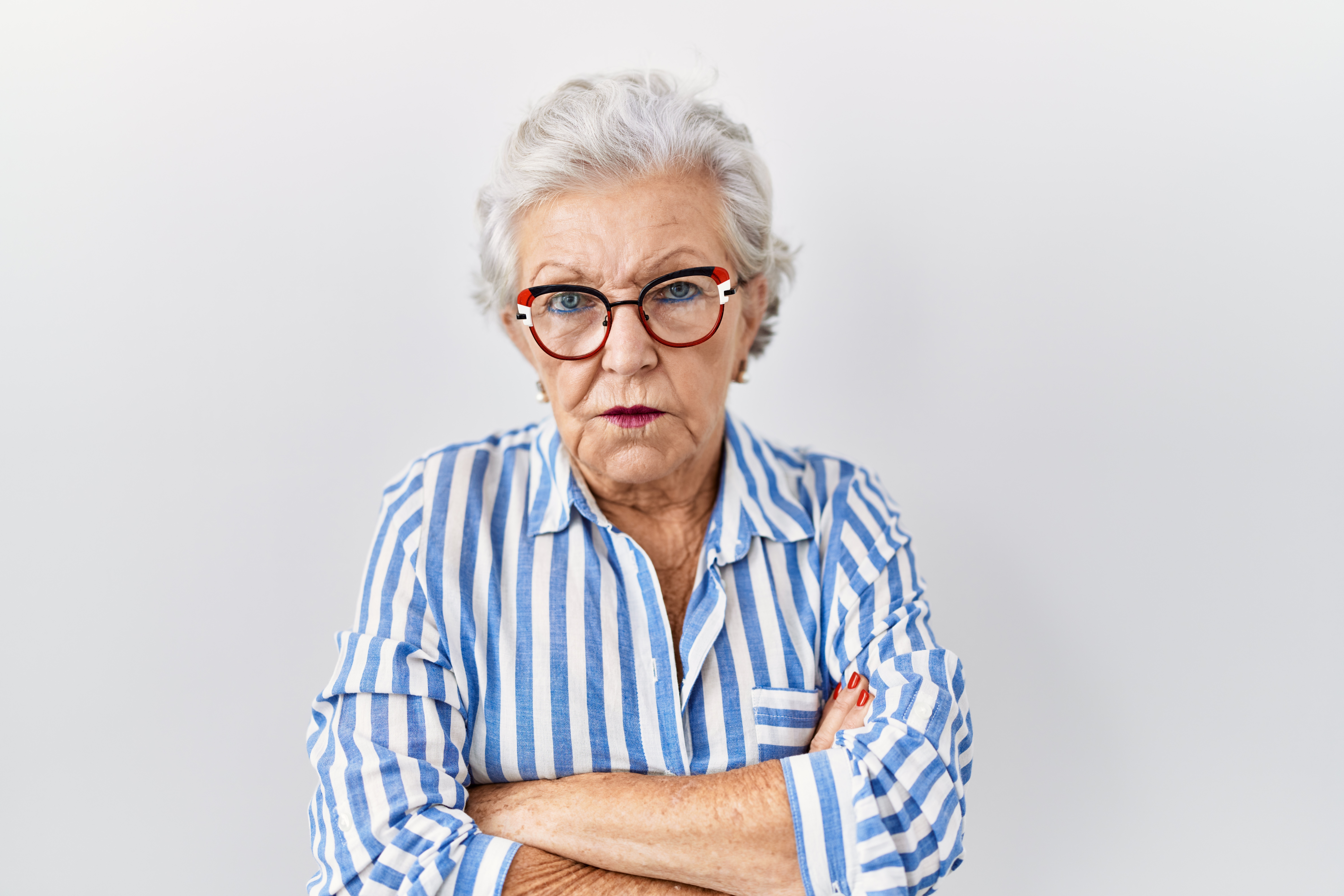 An angry senior woman | Source: Shutterstock