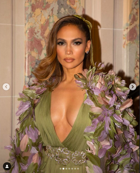 Jennifer Lopez posing for a picture in her green dress posted on January 25, 2024 | Source: Instagram/jlo