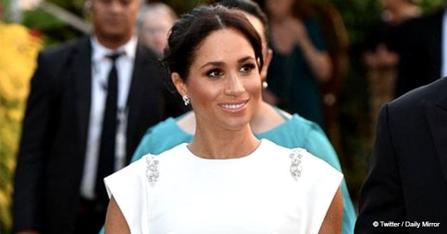 Meghan Markle looks like a Greek goddess in a floor-length white gown chosen for a reception