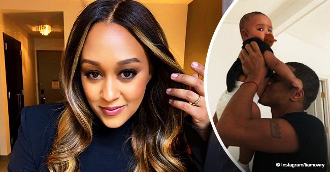 Tia Mowry shares heartwarming moment of her husband kissing their growing baby in new photo