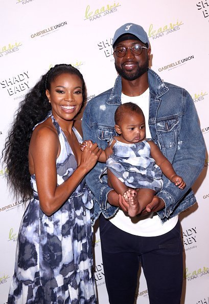 Gabrielle Union, Dwyane Wade, and Kaavia James Union Wade visit New York & Company Store in Burbank, CA to launch Kaavi James Collection | Photo: Getty Images