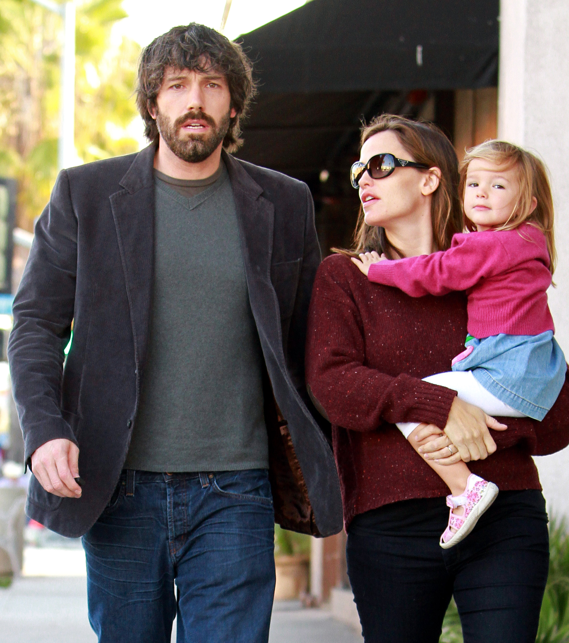 Ben and Jennifer were photographed with their young child, Fin, during a family outing in Santa Monica on October 26, 2011. The photo captured one of the family's early public appearances together as Fin was carried by Garner. | Source: Getty Images