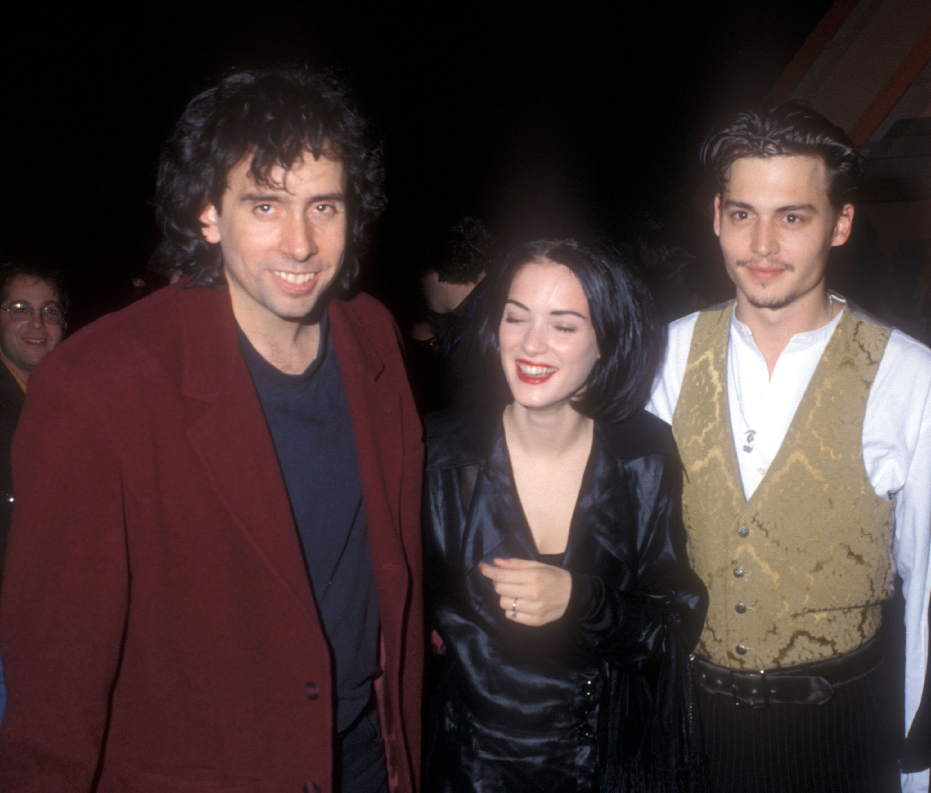 Tim Burton, Winona Ryder, and Johnny Depp at the "Edward Scissorhands" premiere on December 6, 1990. | Source: Barry King/WireImage/Getty Images