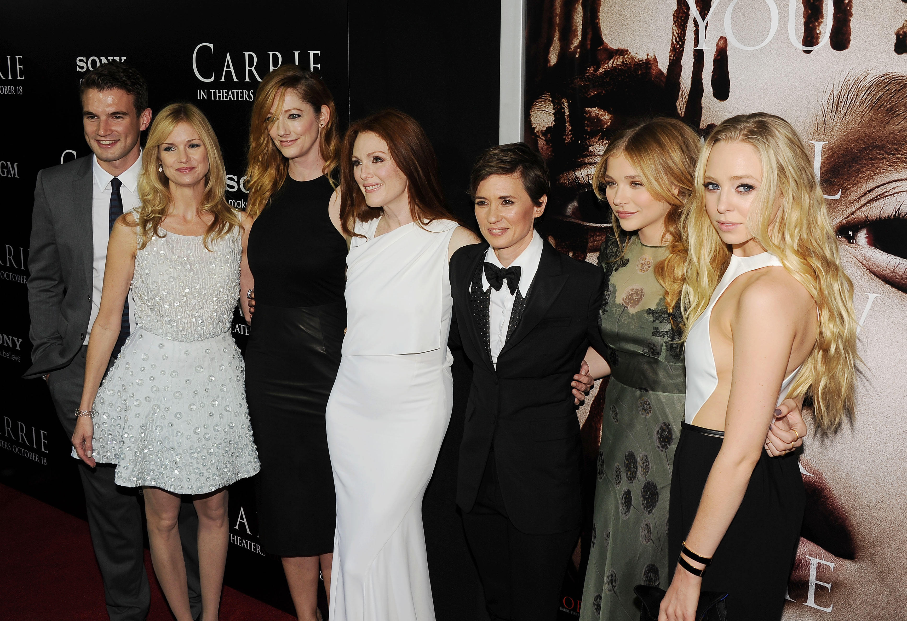 Alex Russell, Cynthia Preston, Judy Greer, Julianne Moore, director Kimberly Pierce, actors Chloe Grace Moretz, Portia Doubleday attend the premiere of "Carrie" at ArcLight Hollywood on October 7, 2013, in Hollywood, California. | Source: Getty Images