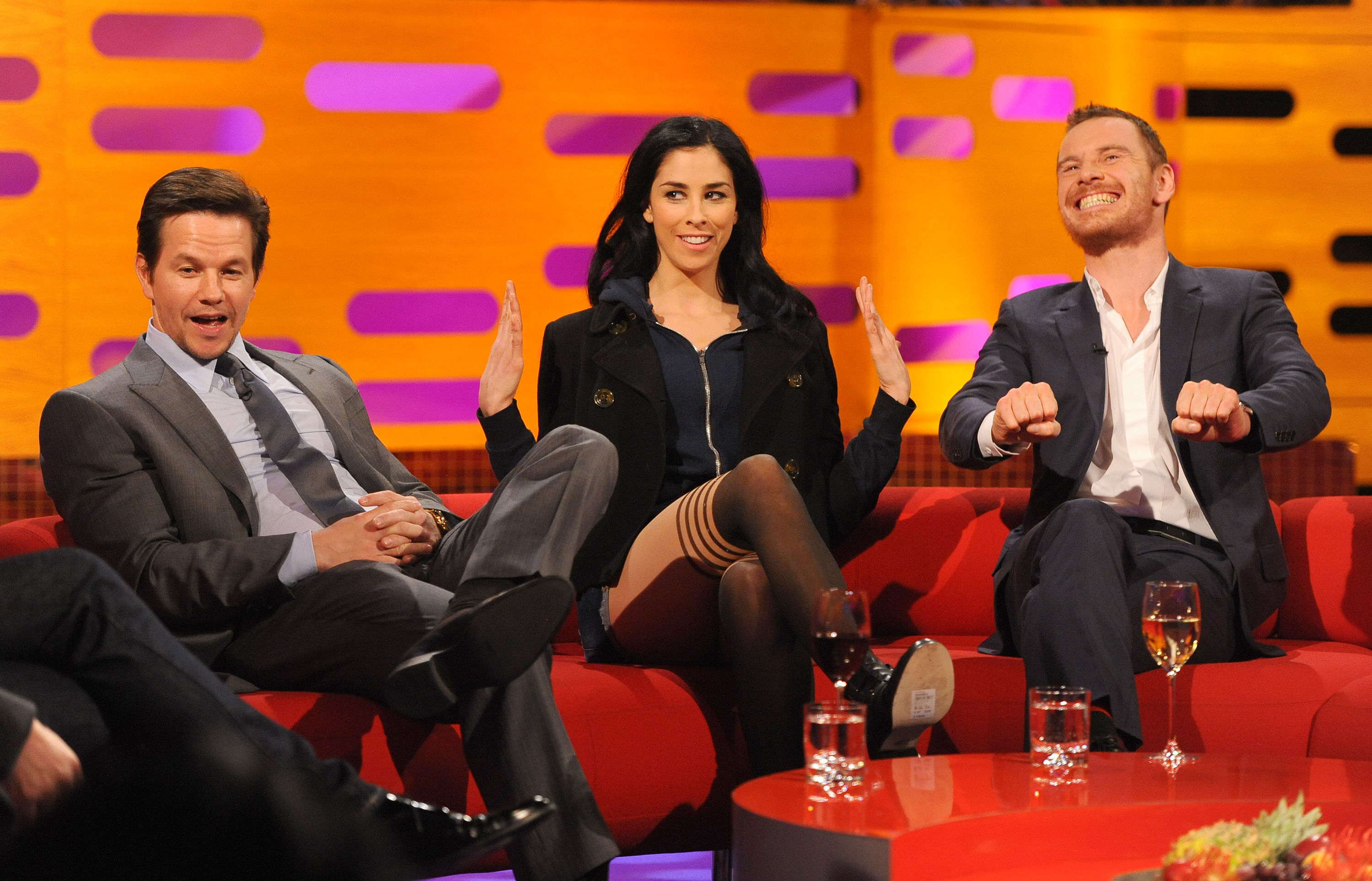 Mark Wahlberg, Sarah Silverman and Michael Fassbender during a recording of the Graham Norton Show, at the London Studios on 2 July 2013. | Source: Getty Images