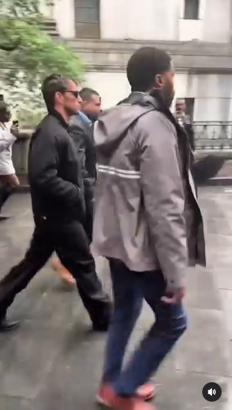 A screenshot of Alex Fine leaving court in New York from a post dated May 15, 2025. | Source: Instagram/people