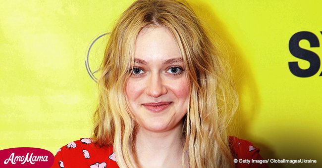 Dakota Fanning flaunts her bust in a plunging gown while cuddling up to her boyfriend