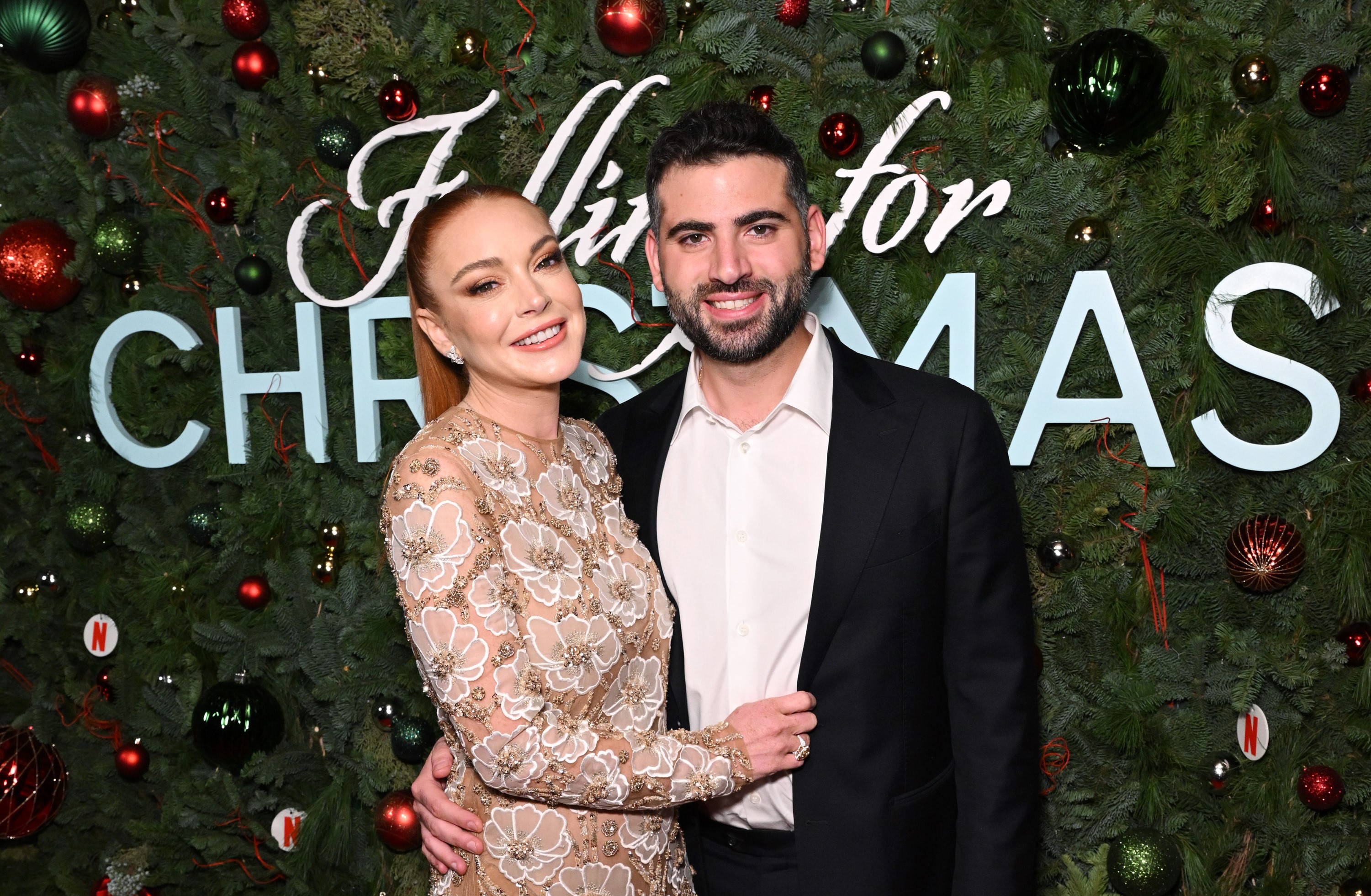 Lindsay Lohan and her husband, Bader Shammas at Netflix’s "Falling For Christmas" fan screening on November 9, 2022, in New York City. | Source: Getty Images