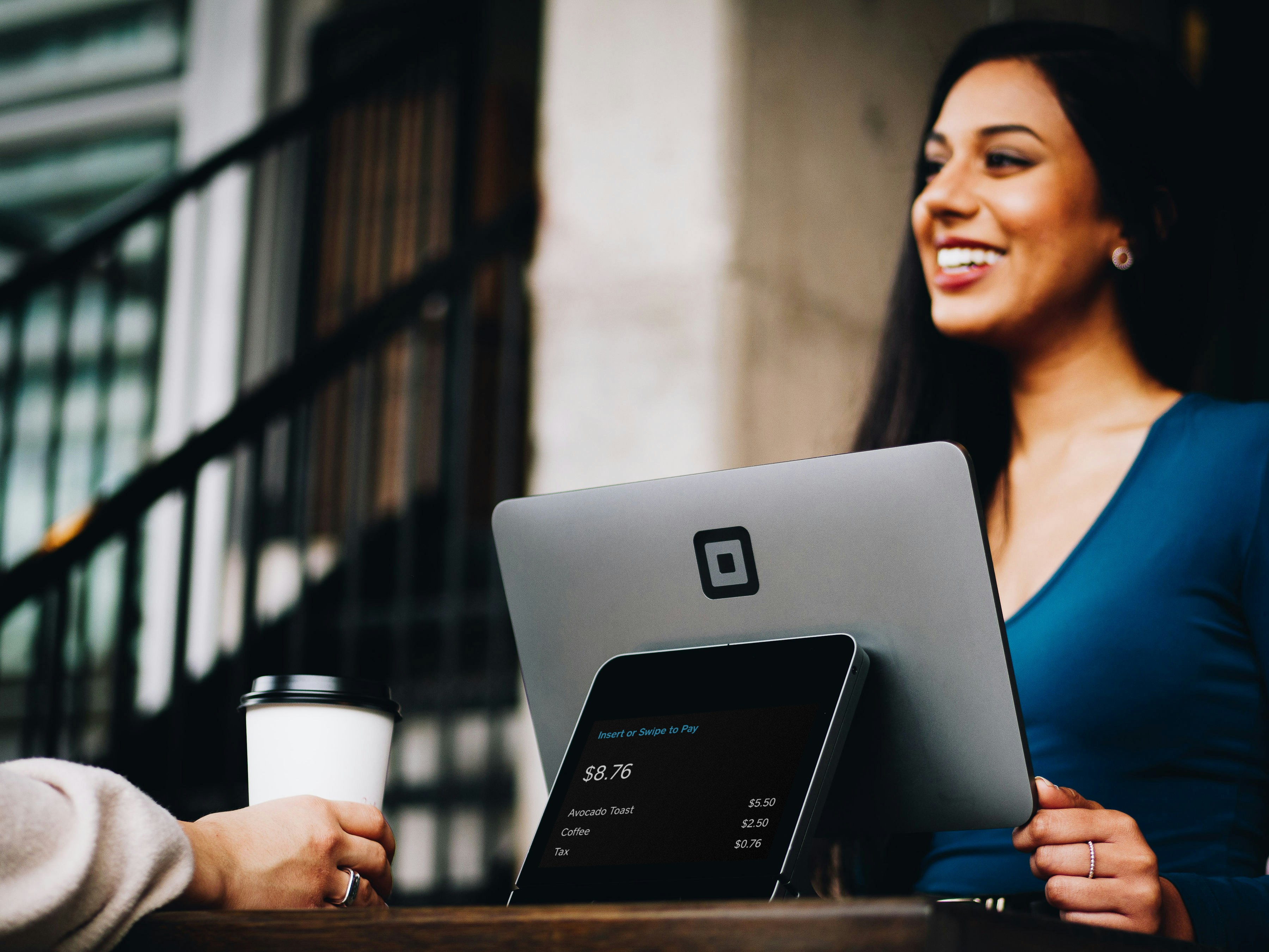 A happy cashier | Source: Unsplash