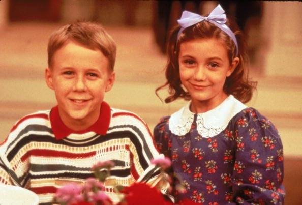 Benjamin Salisbury and Madeline Zima in a promotional portrait for the television series, "The Nanny," 1993 | Photo: Getty Images