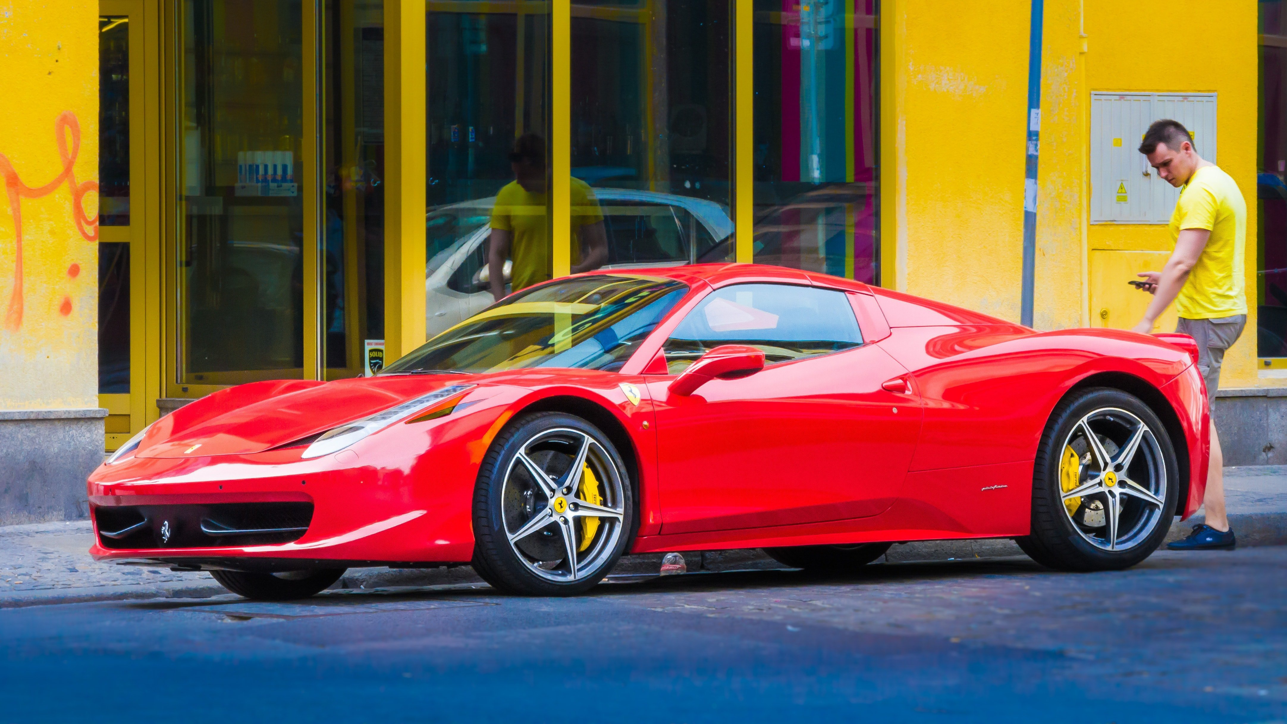 Red Ferrari on a street. | Source: Pixabay