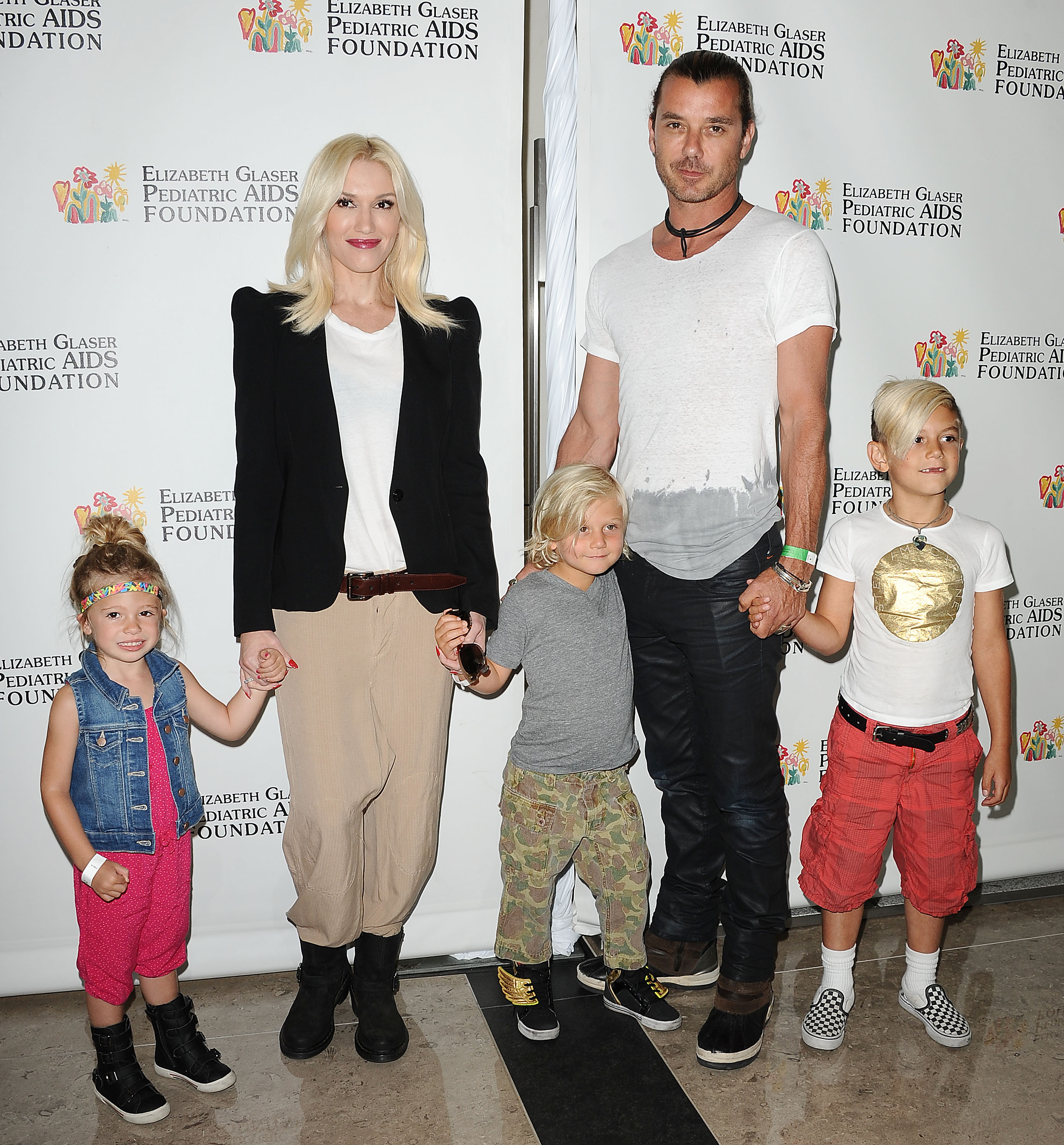 Gwen Stefani and Gavin Rossdale with their children, Kingston, Zuma, and Apollo, in Los Angeles in 2013 | Source: Getty Images