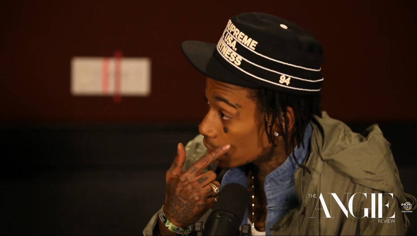 Wiz Khalifa discusses his growing collection of face tattoos during an interview published on June 4, 2014. | Source: YouTube/Hot 97