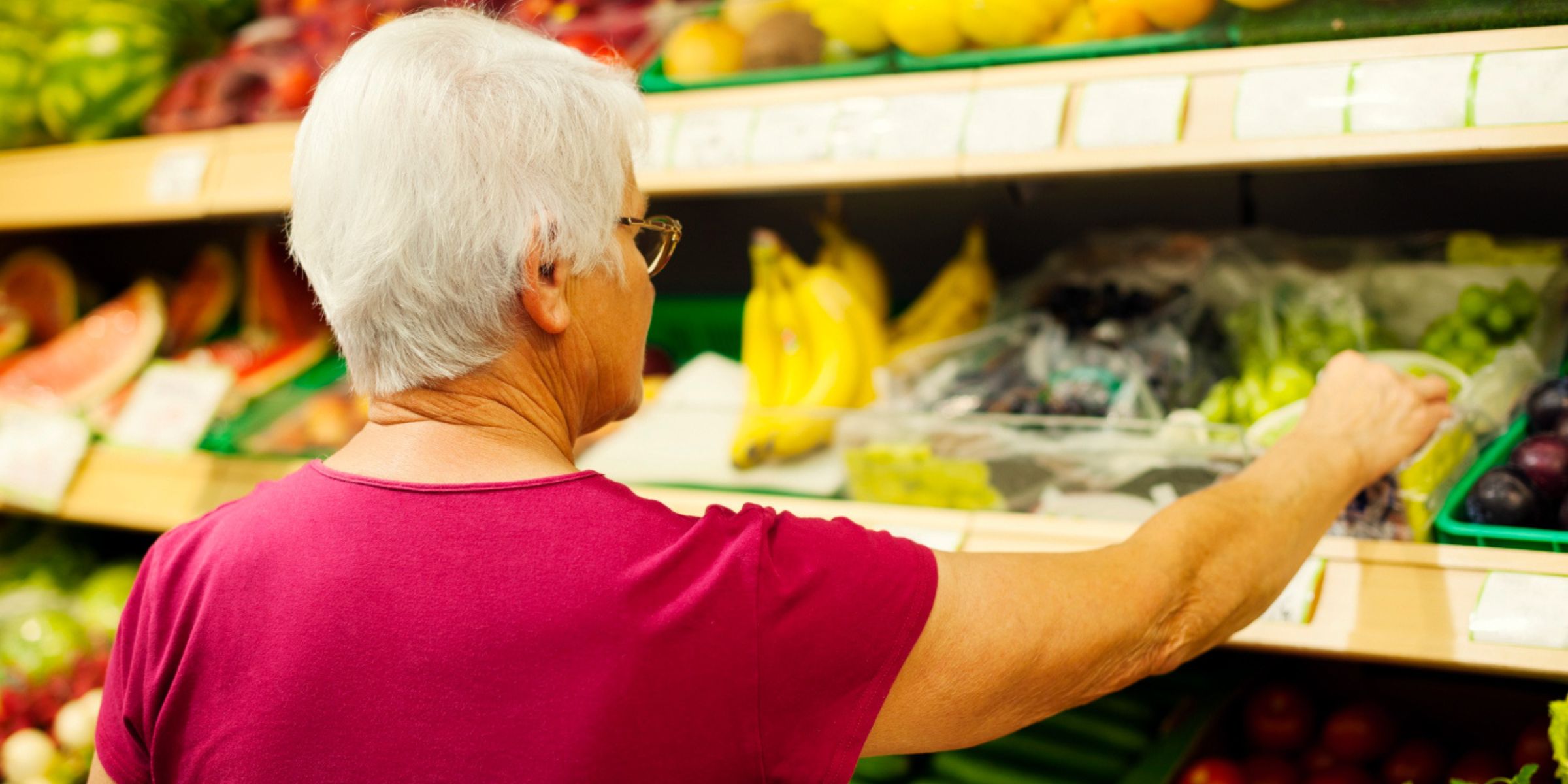 A senior woman in a store | Source: Freepik