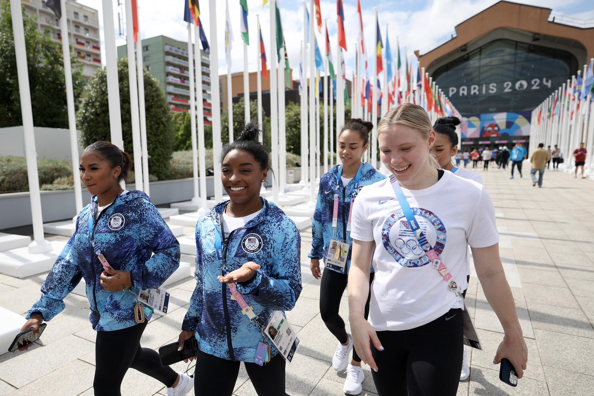 Simone Biles with some of her fellow team U.S.A. gymnasts, Jordan Chiles, Jade Carey, Sunisa Lee and Hezly Rivera, ahead of the Paris Olympic Games in Paris, France on July 23, 2024 | Source: Getty Images