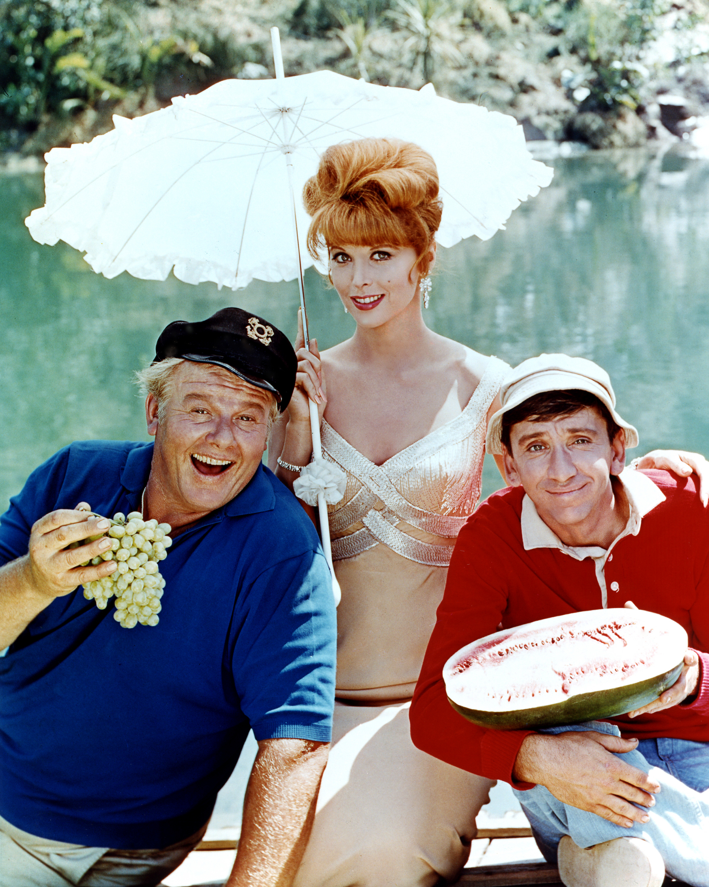 [L-R] Alan Hale Jr. (1921 - 1990) as The Skipper, Tina Louise as Ginger Grant and Bob Denver (1935 - 2005) as Gilligan in the television series 'Gilligan's Island', circa 1964. | Source: Getty Images