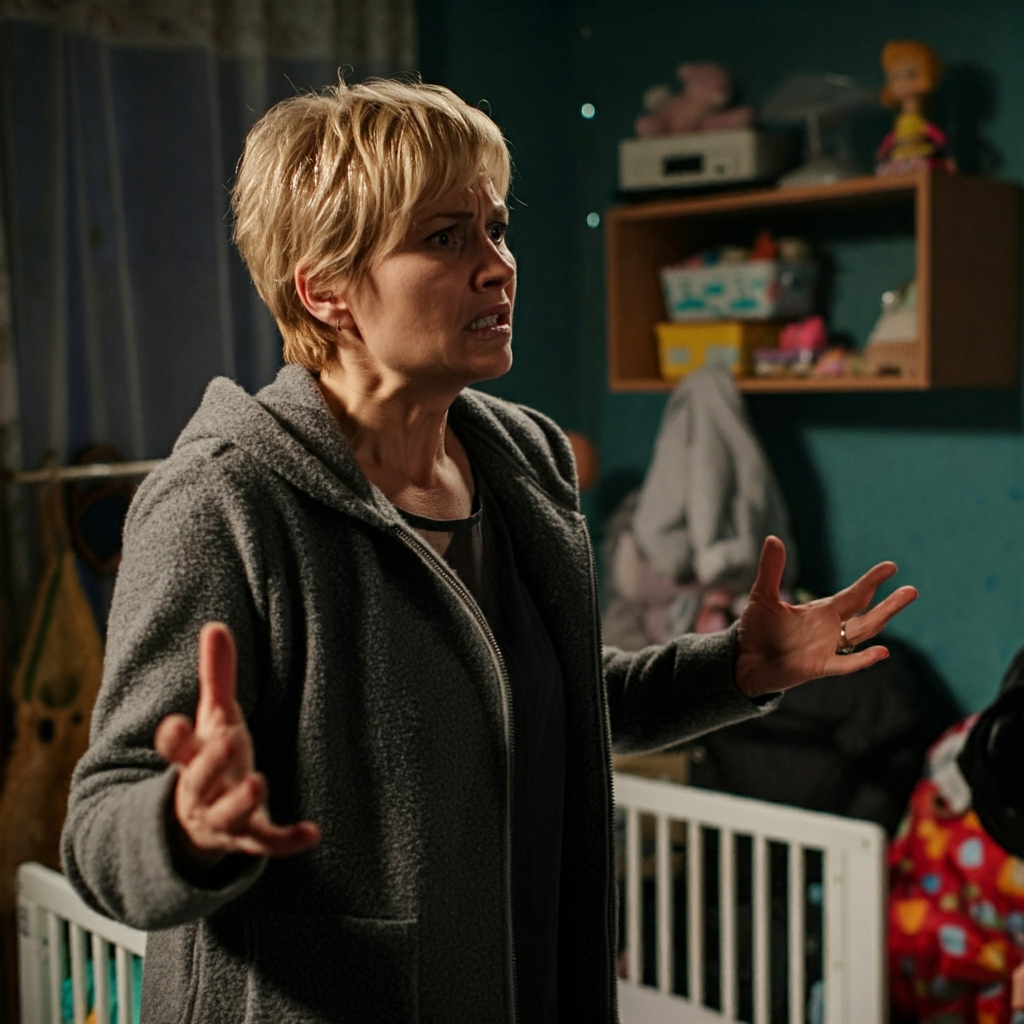 A woman looking angry in a cluttered apartment | Source: Gemini