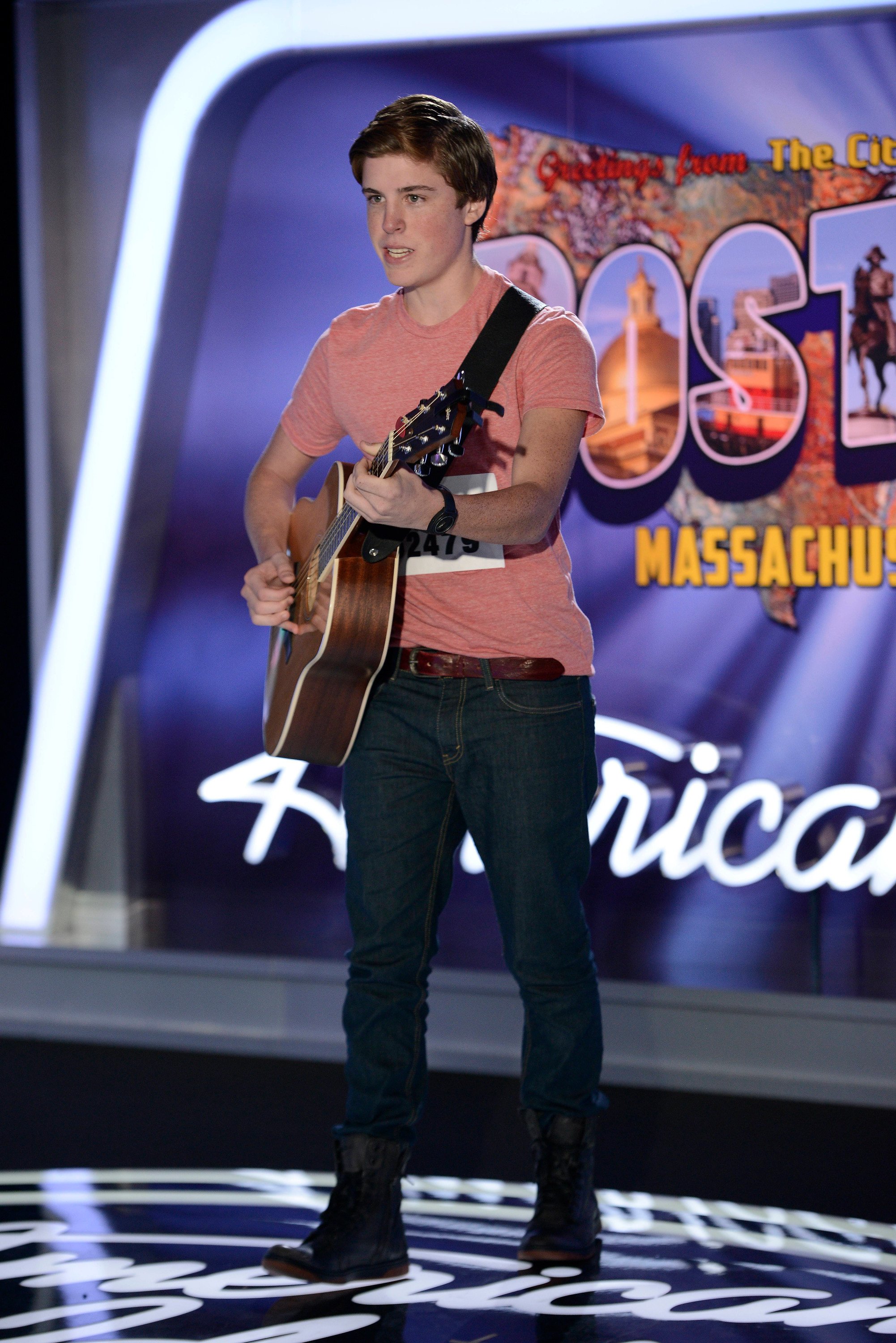 Contestant Sam Woolf performs in front of the judges  on the 13th season of "American Idol" aired on Jan. 15 2014 | Photo by FOX Image Collection via Getty Images
