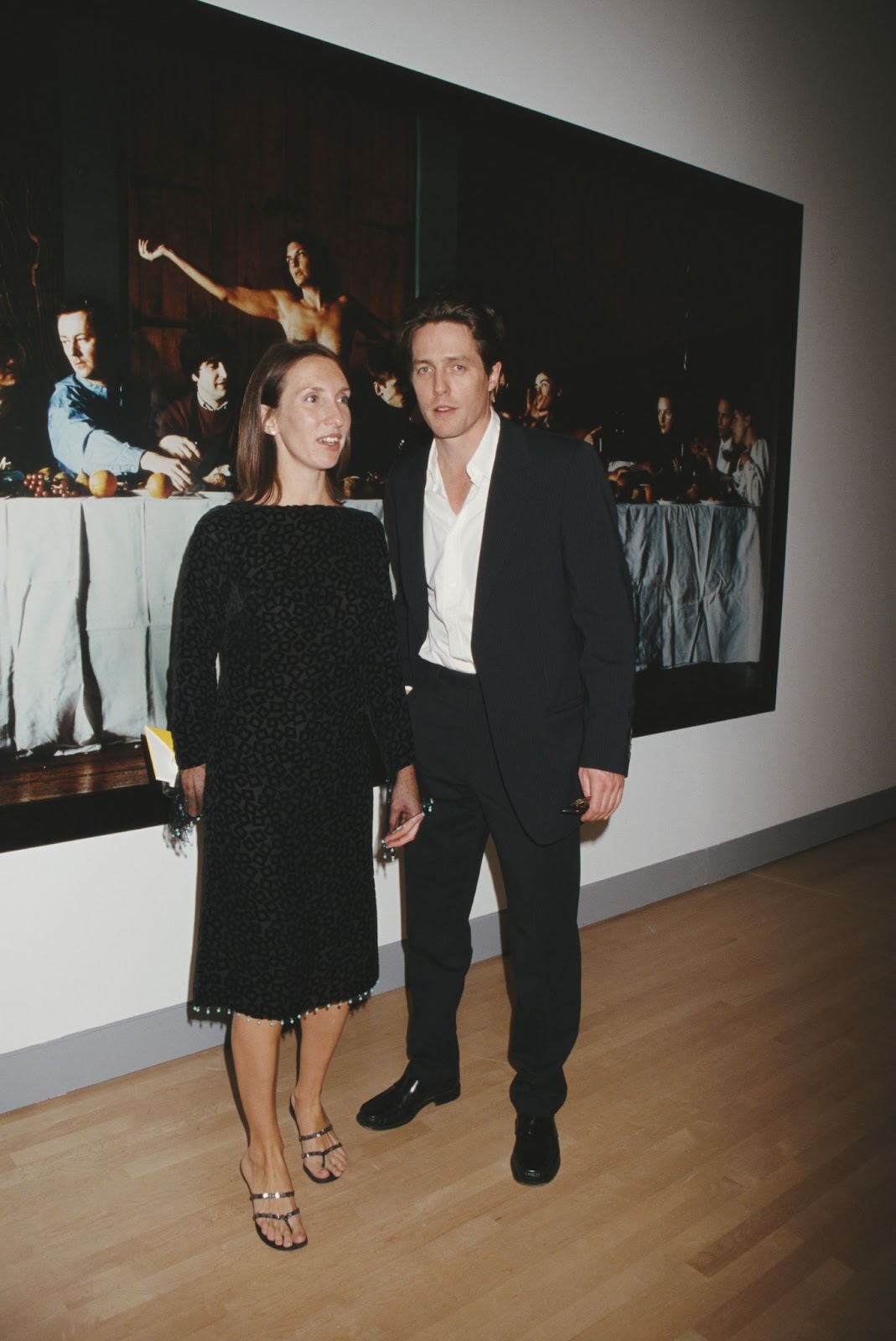 Sam Taylor and Hugh Grant at the Sensation Benefit and Exhibition Preview in New York circa 1999. | Source: Getty Images