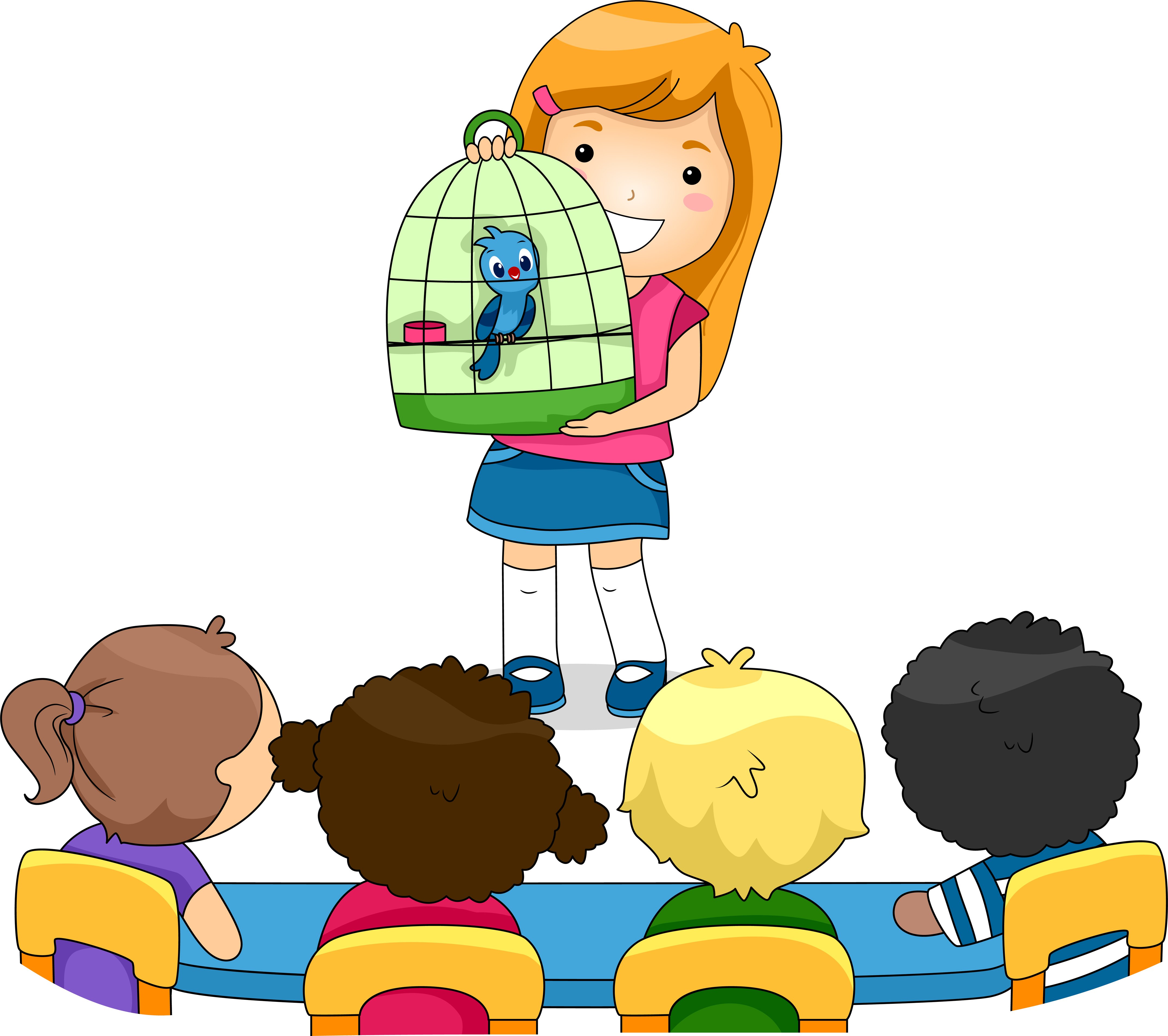 Girl holding bird cage in classroom | Photo: Shutterstock