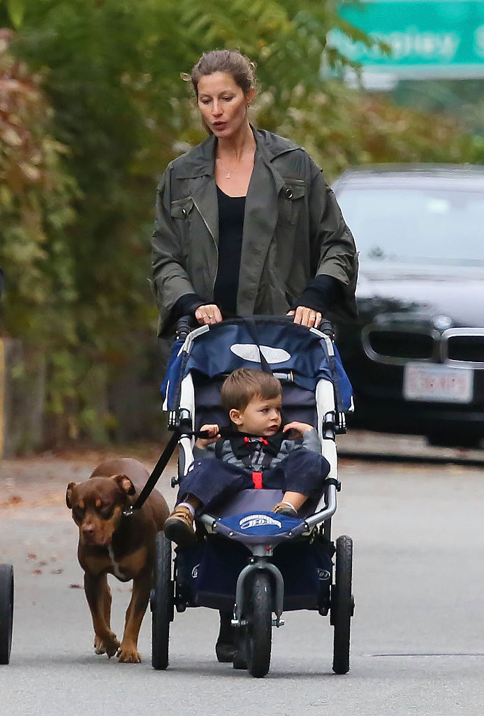 Gisele Bundchen and her son Benjamin Rein Brady are seen walking her dog Lua on September 22, 2012 in Boston, Massachusetts. (Photo by Stickman/Bauer-Griffin/GC Images)
