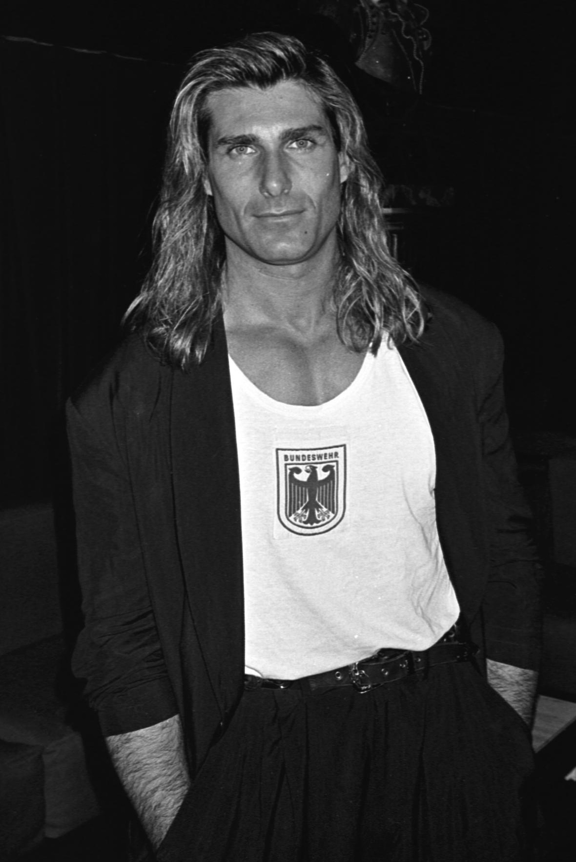 The romance icon featured on numerous book covers has not yet found his true love, but AI now allows fans to imagine what could have been. In this photo, Fabio visited The Roxy in 1990, in New York City, New York. | Source: Getty Images