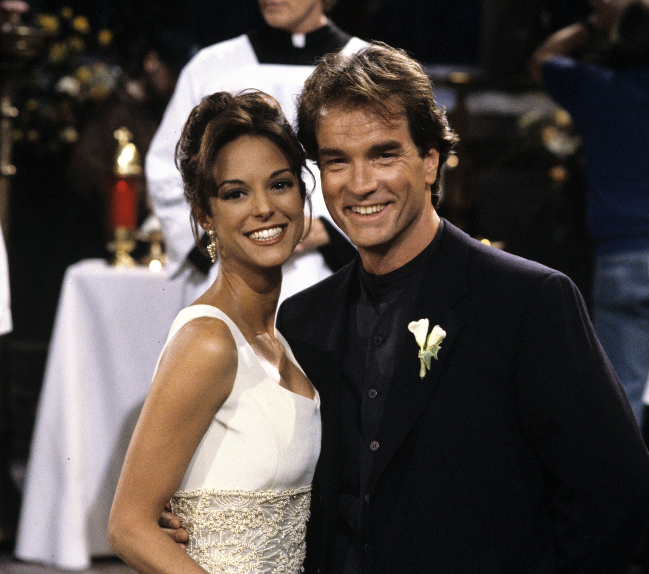  Eva LaRue and John Callahan during their 1995 wedding scene of the TV show "All My Children." | Photo: Getty Images