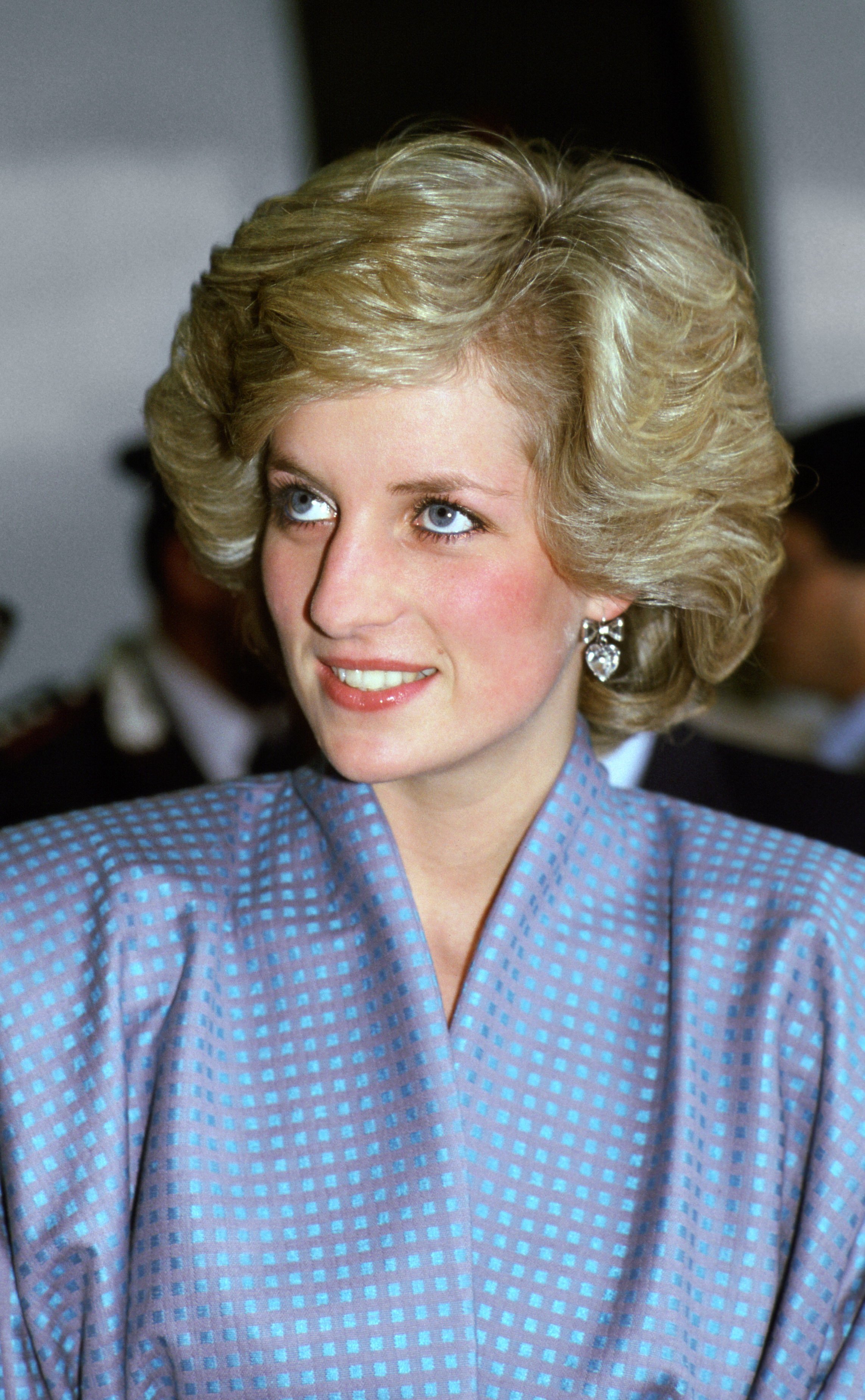 Princess Diana pictured wearing a blue suit during a visit to Millan, Italy ┃Source: Getty Images