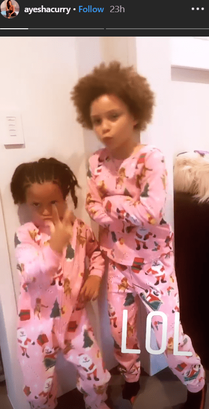 Ayesha Curry shared a picture of her daughters Riley Curry and Ryan Curry posing in pink Christmas pyjamas | Source: Instagram.com/ayeshacurry