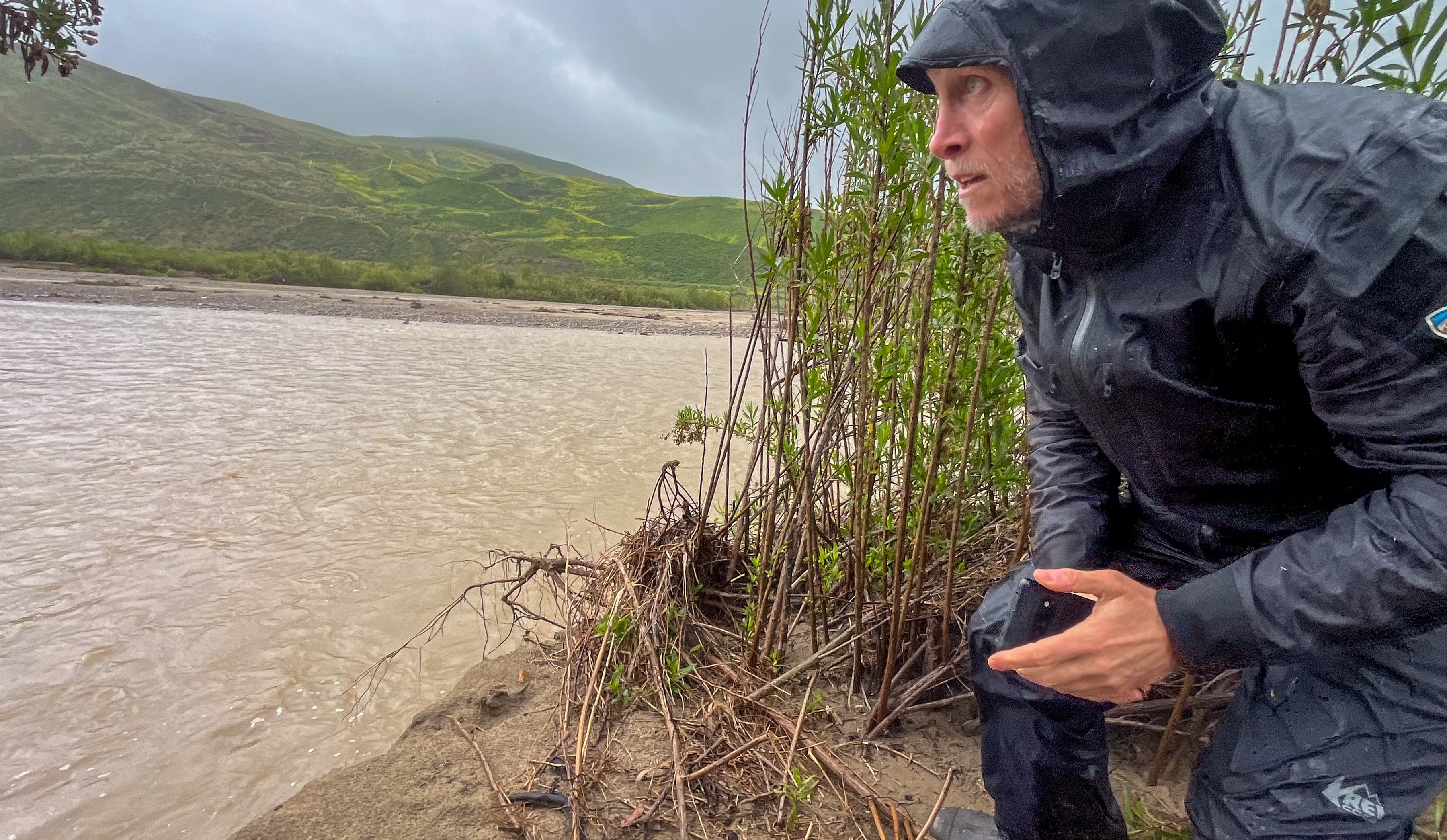 Researcher Mike Singer looking at the Santa Clara River in Ventura County in Santa Paula, California on April 14, 2024 | Source: Getty Images