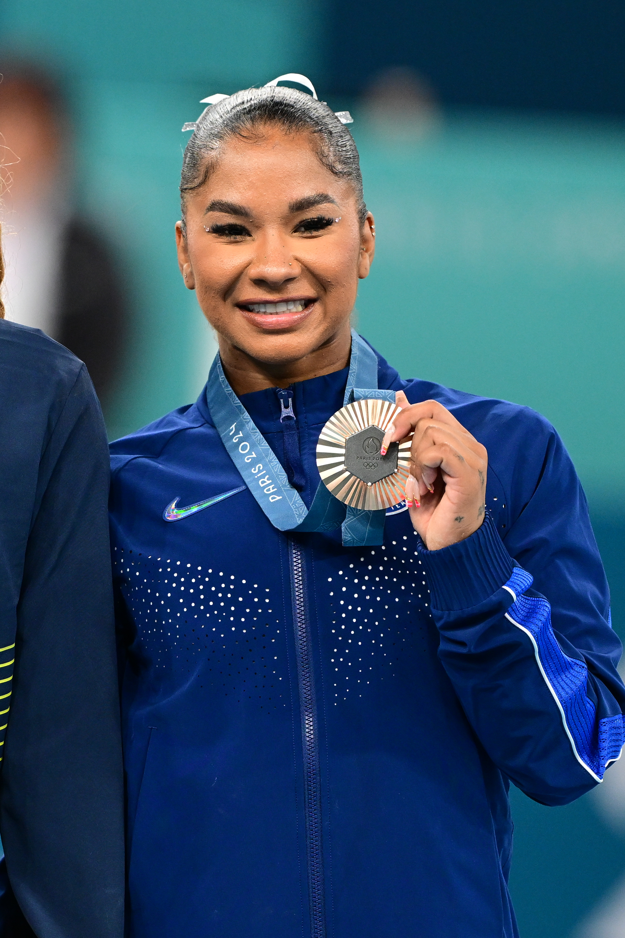 Jordan Chiles poses with her bronze medal at the Women's Floor Exercise Medal Ceremony during the Paris 2024 Olympics on August 5, 2024 | Source: Getty Images