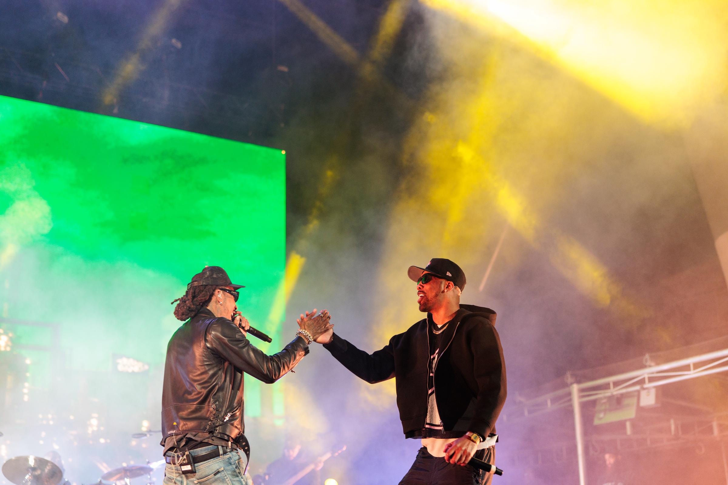 Wiz Khalifa and Chevy Woods perform at Red Rocks Amphitheatre on April 19, 2026, in Morrison, Colorado. | Source: Getty Images