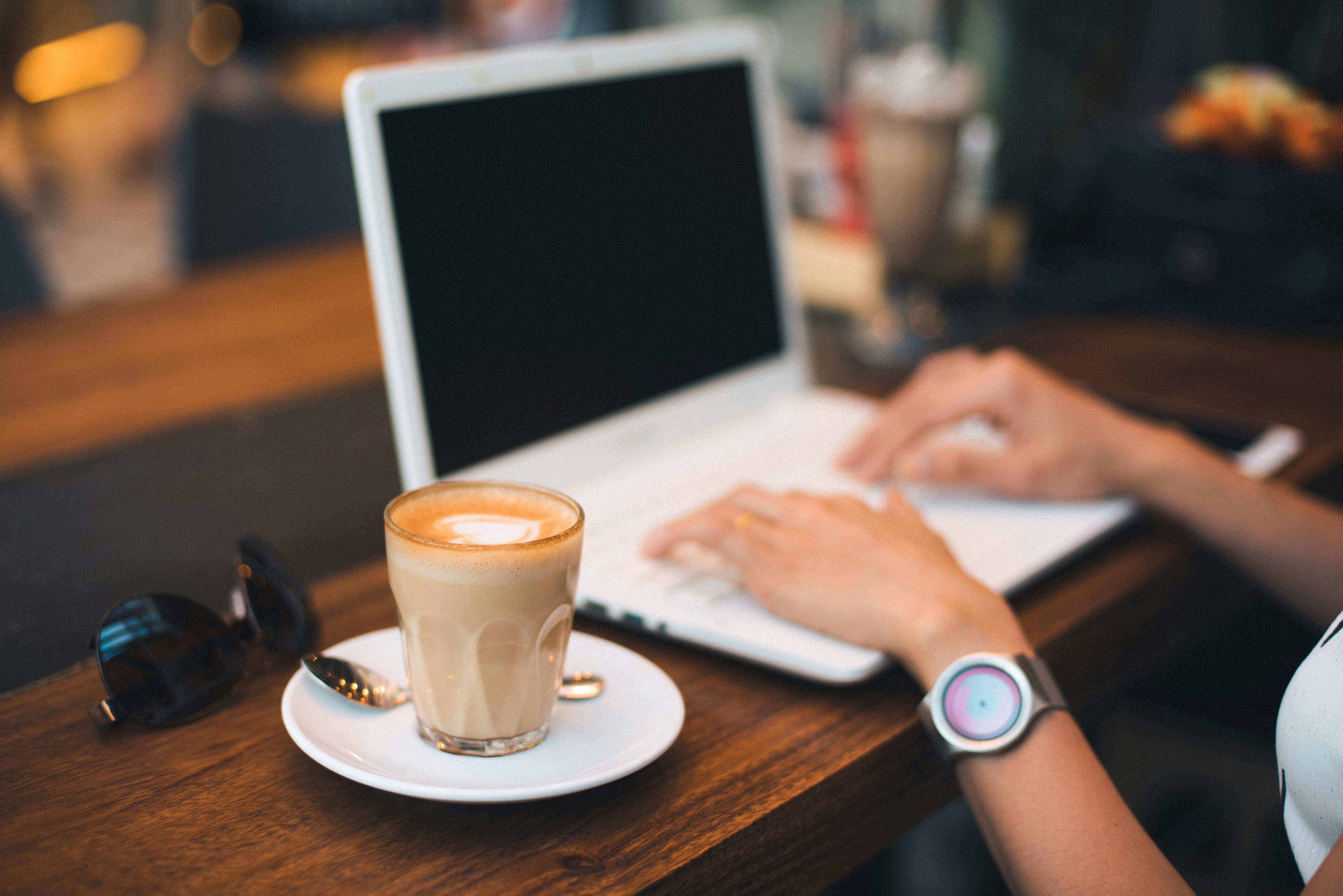 A woman working at a coffee shop | Source: Pexels