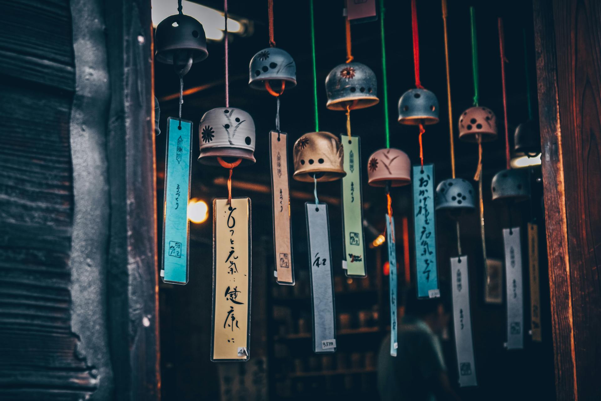 Japanese wind chimes hanging on a doorway | Source: Pexels