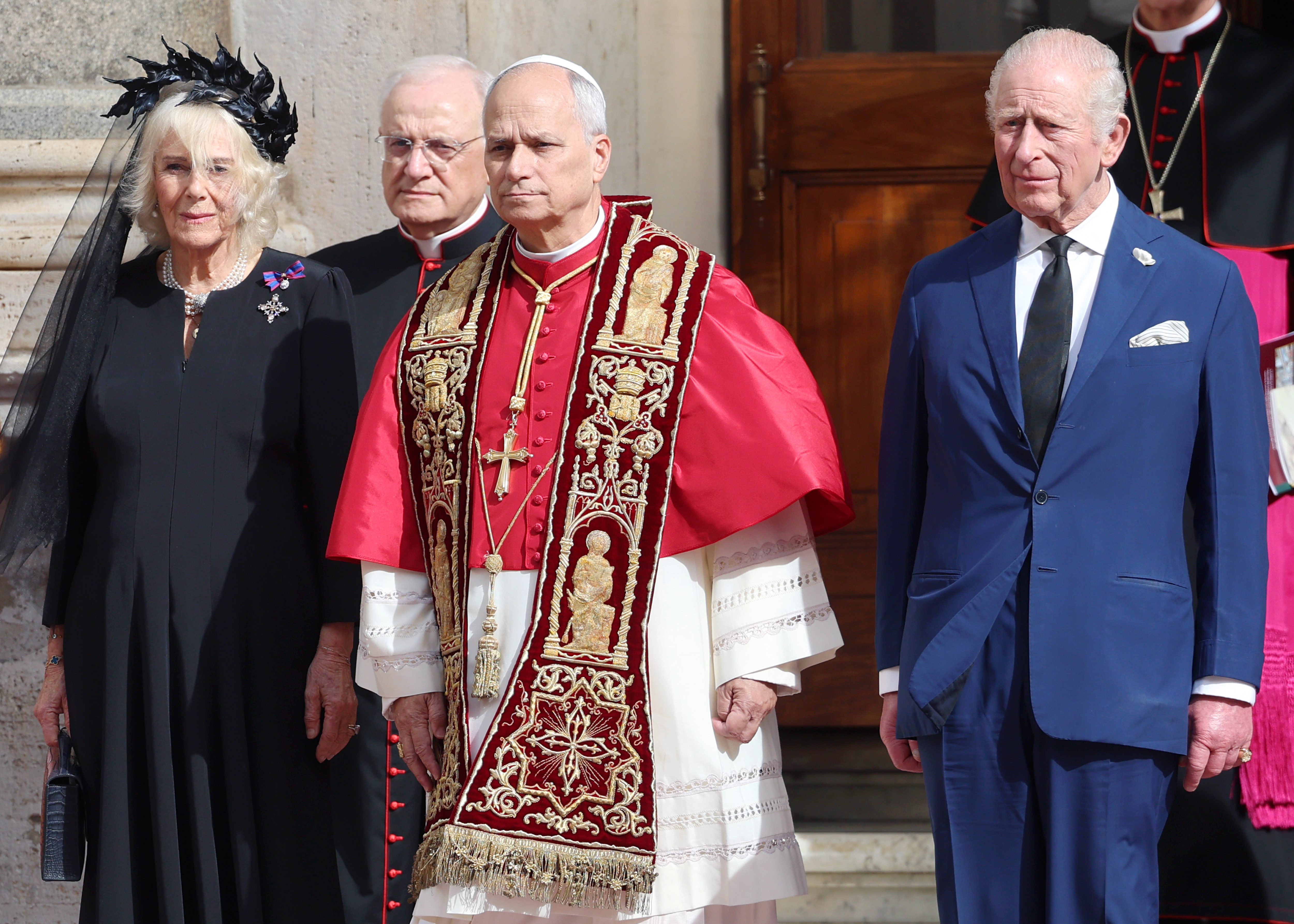 Queen Camilla, Reverend Monsignor Leonardo Sapienza, Pope Leo XIV and King Charles III depart from the San Damaso Courtyard on October 23, 2025 | Source: Getty Images