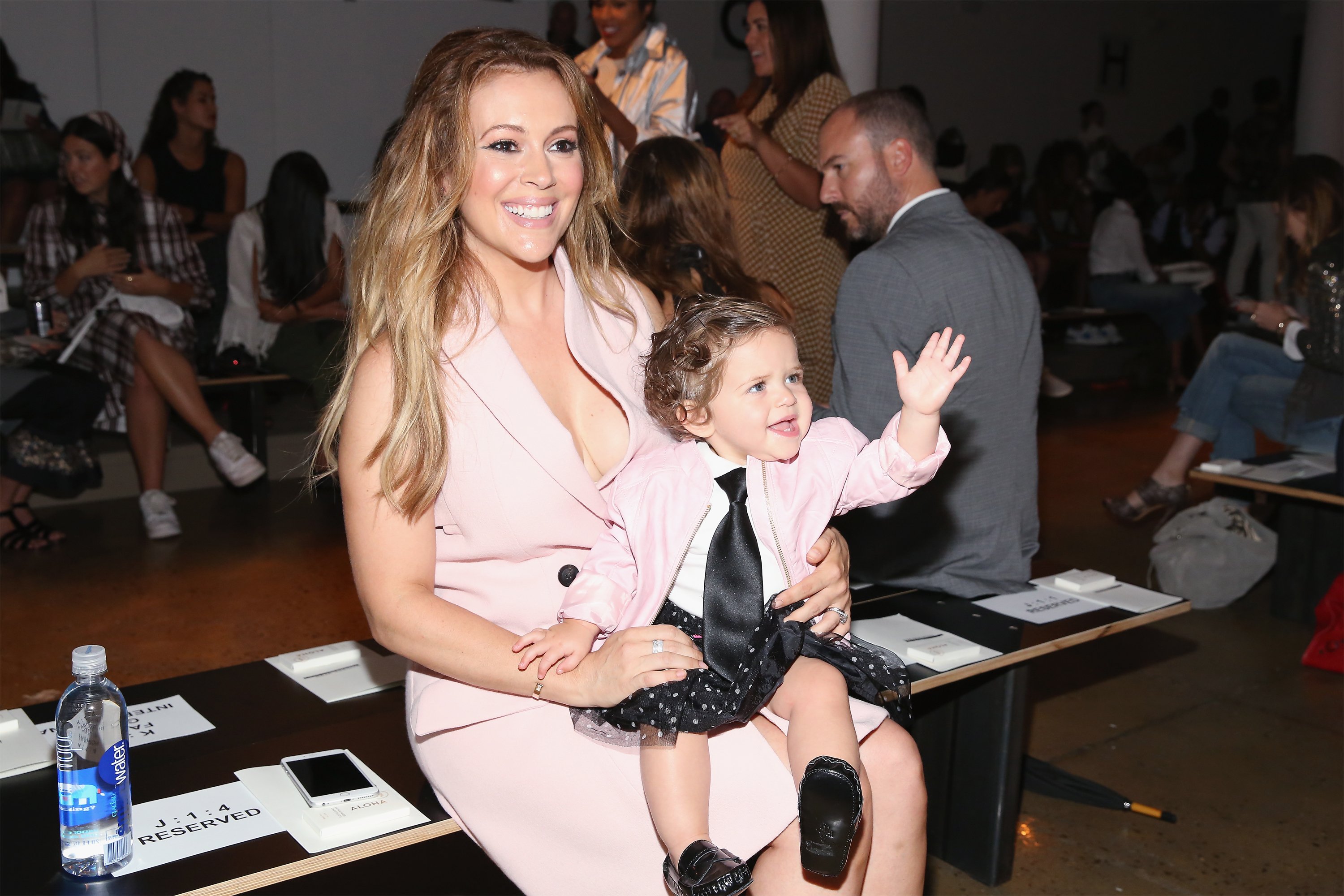  Actress Alyssa Milano and daughter Elizabella Milano attend the Marissa Webb fashion show during Spring 2016 MADE Fashion Week at Milk Studios on September 10, 2015 in New York City. | Source: Getty Images