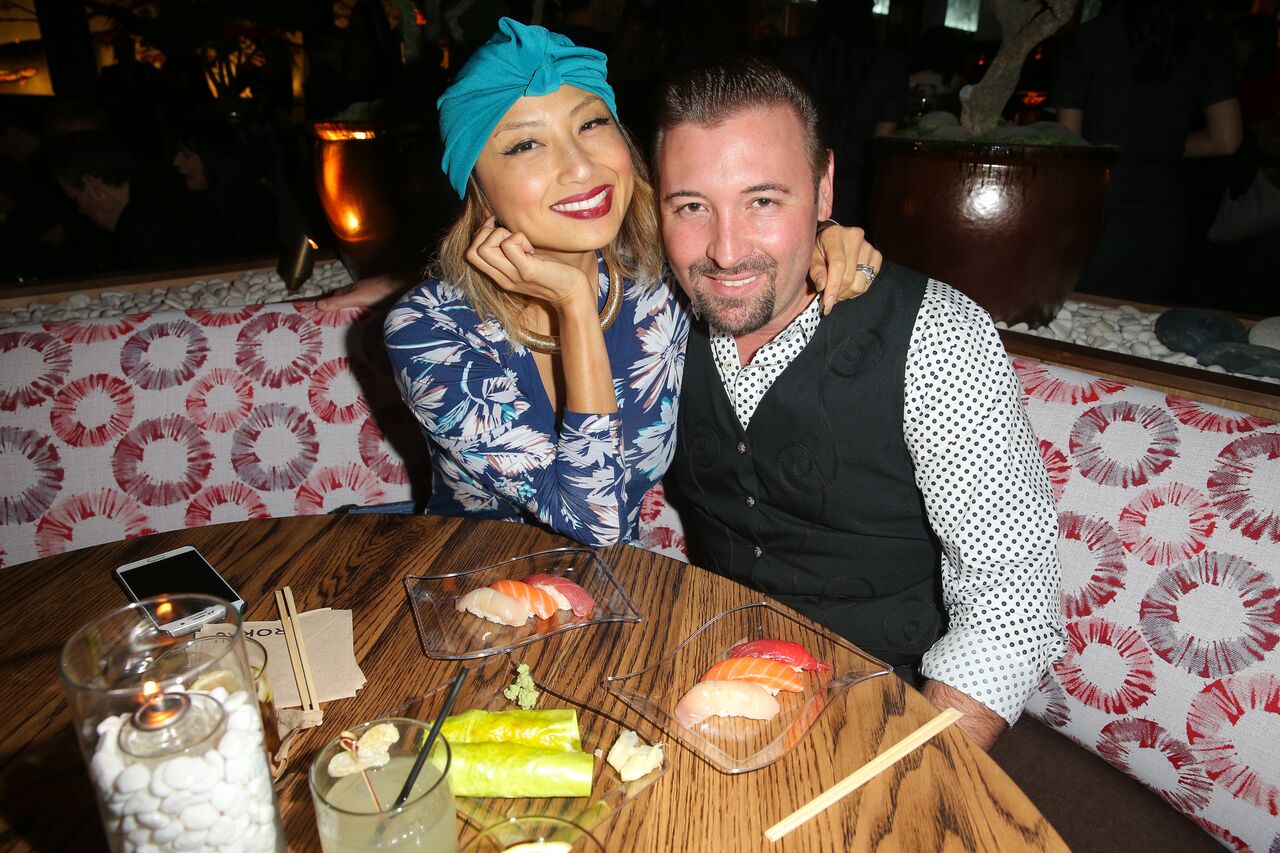 Jeannie Mai and Freddy Harteis attend the Roku grand opening. | Source: Getty Images