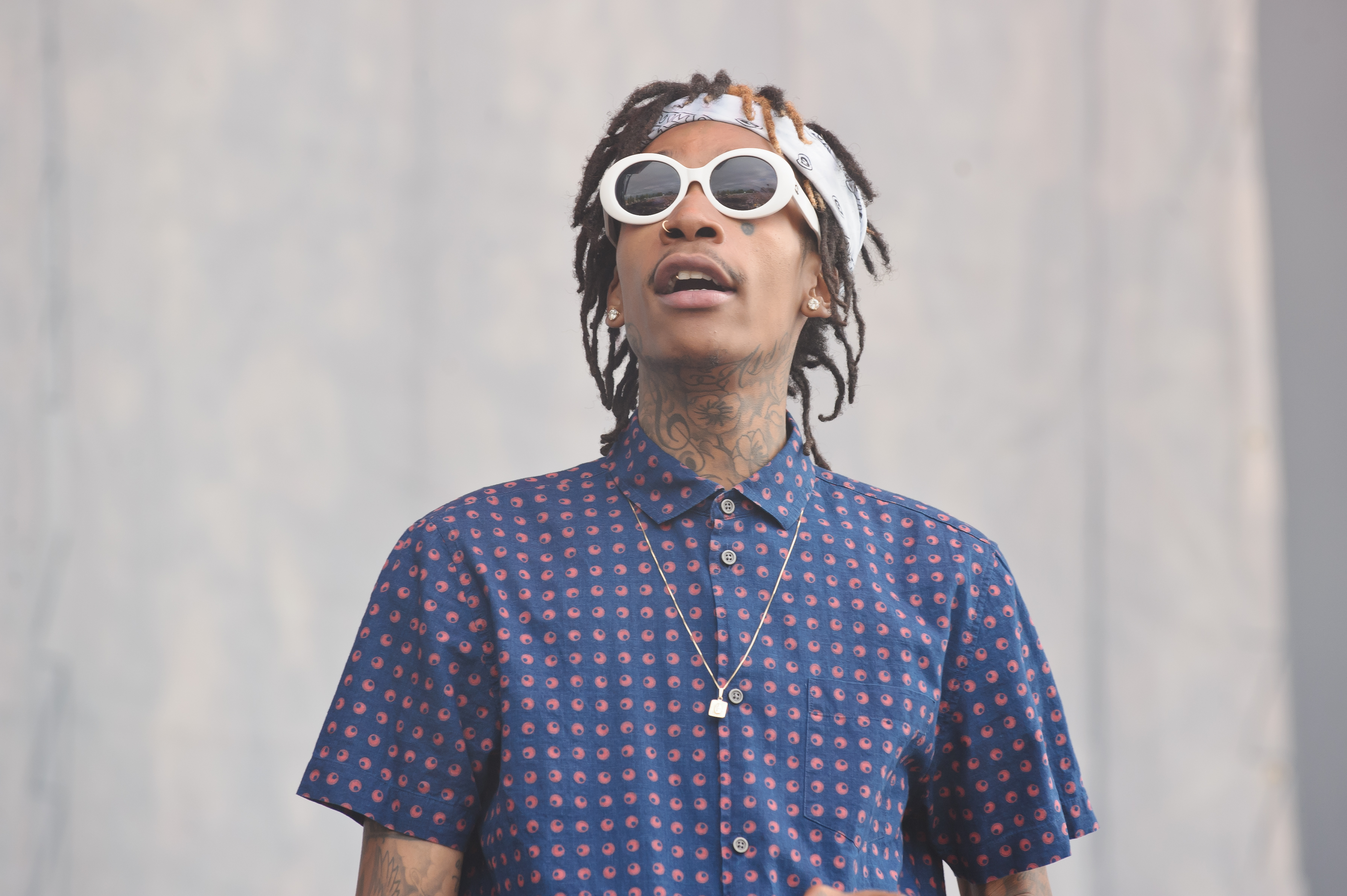 Wiz Khalifa performs on stage at Wireless Festival at Finsbury Park on July 5, 2014, in London, England. | Source: Getty Images