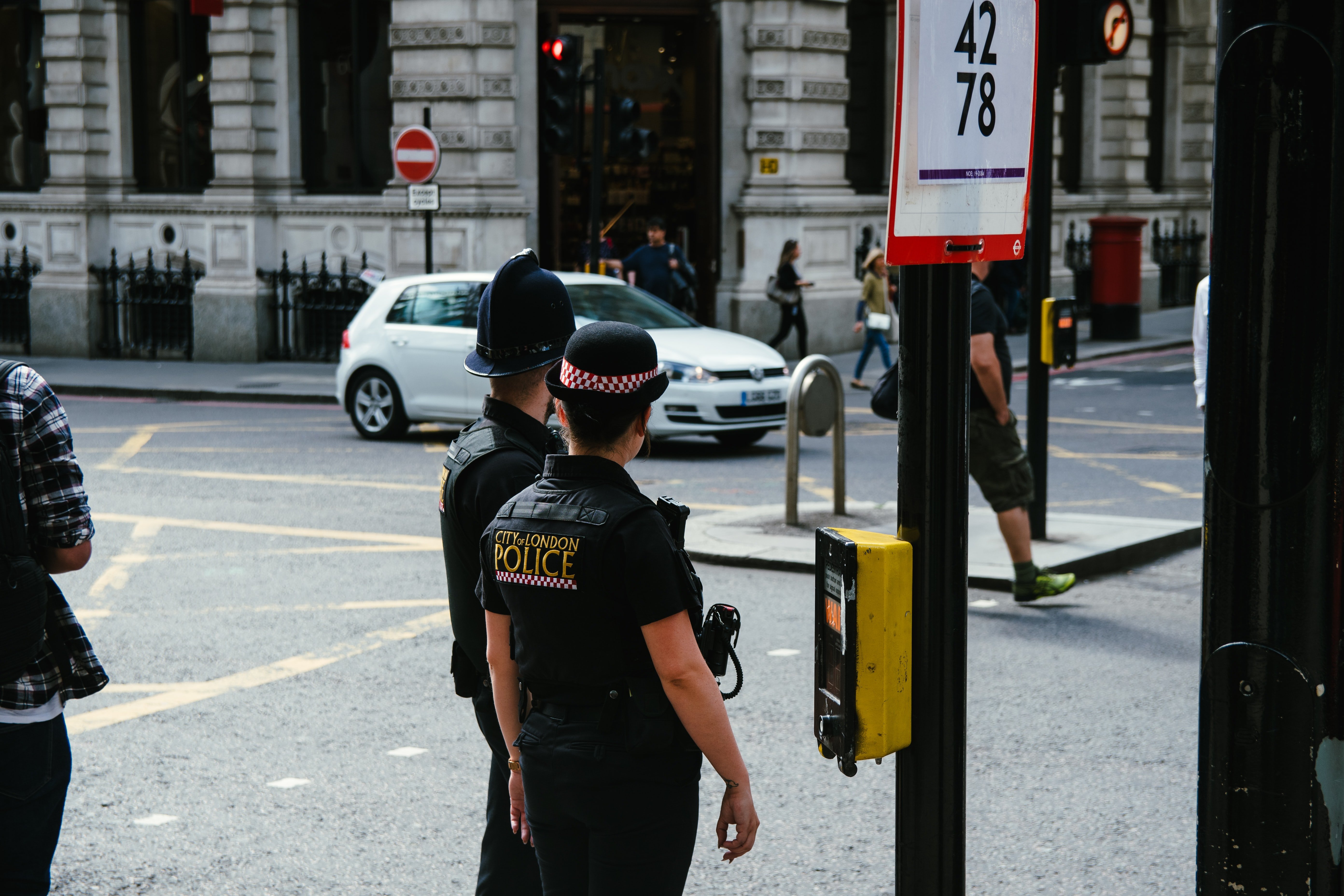 Photo of police officers on the street | Source: Unsplash