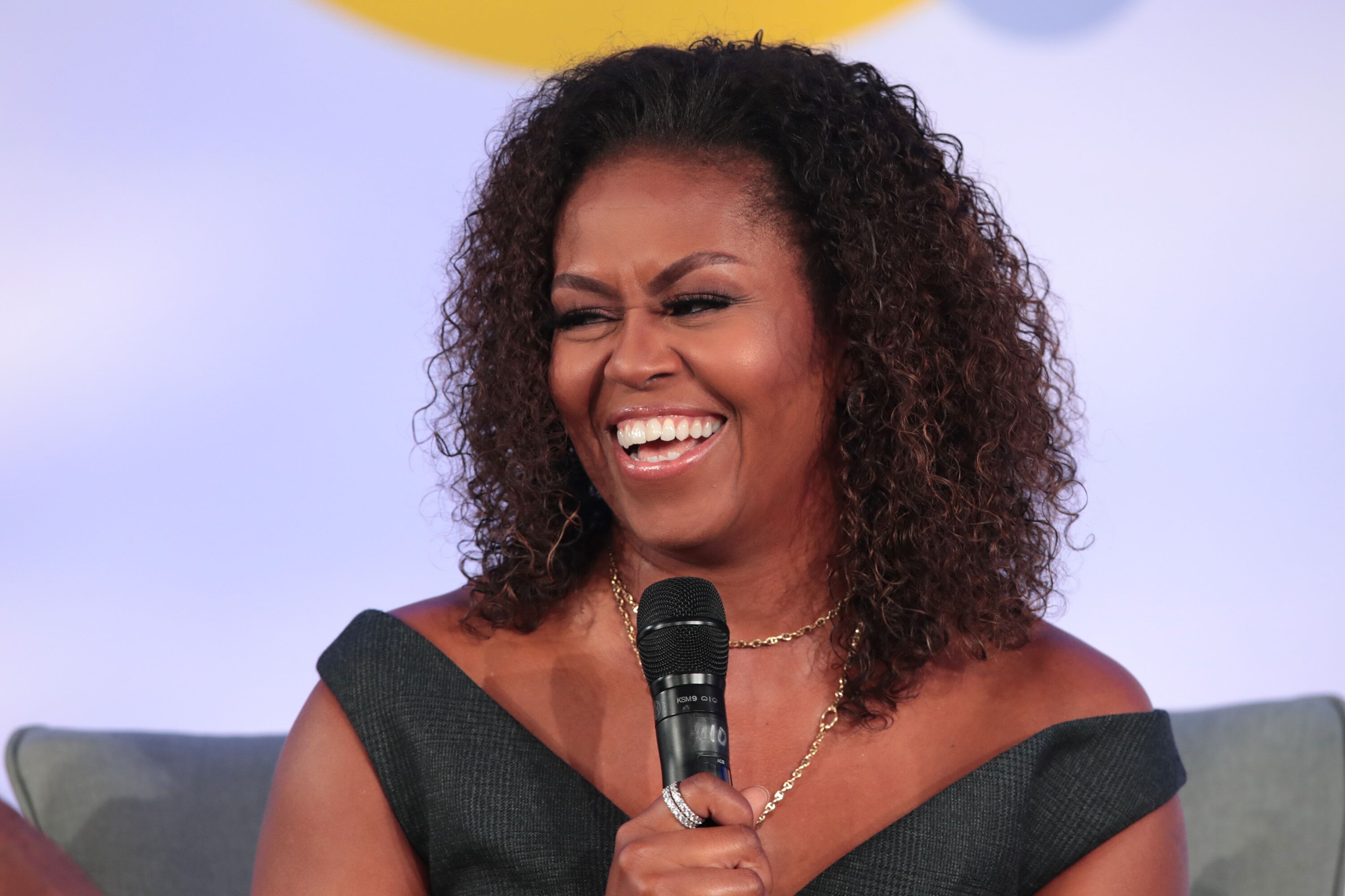 Michelle Obama speaks to guests at the Obama Foundation Summit. | Source: Getty Images