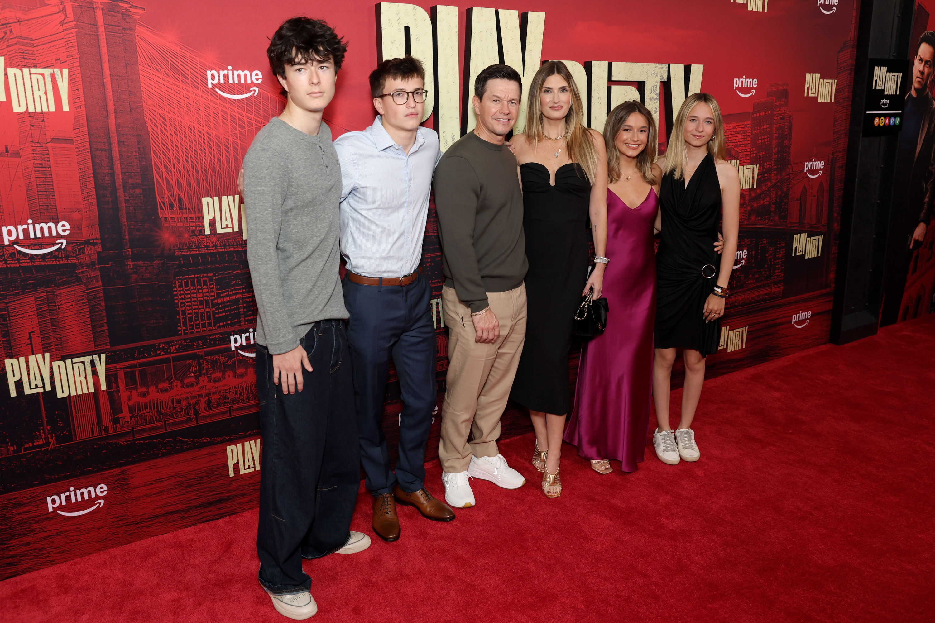 Brendan Joseph, Michael, Mark, Rhea Durham, Ella Rae and Grace Margaret Wahlberg attend Amazon's "Play Dirty" premiere | Source: Getty Images