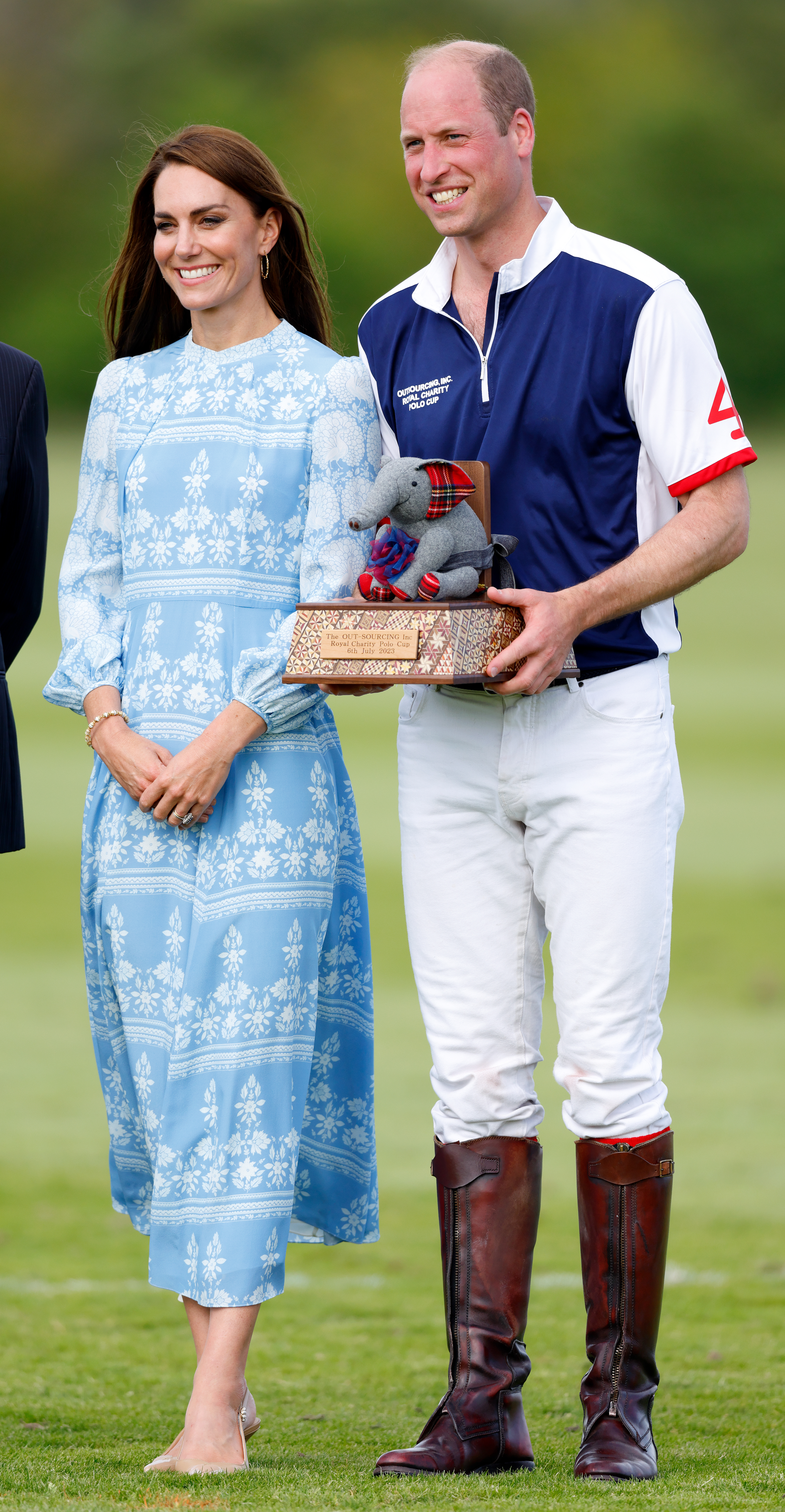 Catherine, Princess of Wales and Prince William, Prince of Wales, are photographed during the prize giving following the Out-Sourcing Inc. Royal Charity Polo Cup 2023 at Guards Polo Club, Flemish Farm, on July 6, 2023, in Windsor, England | Source: Getty Images