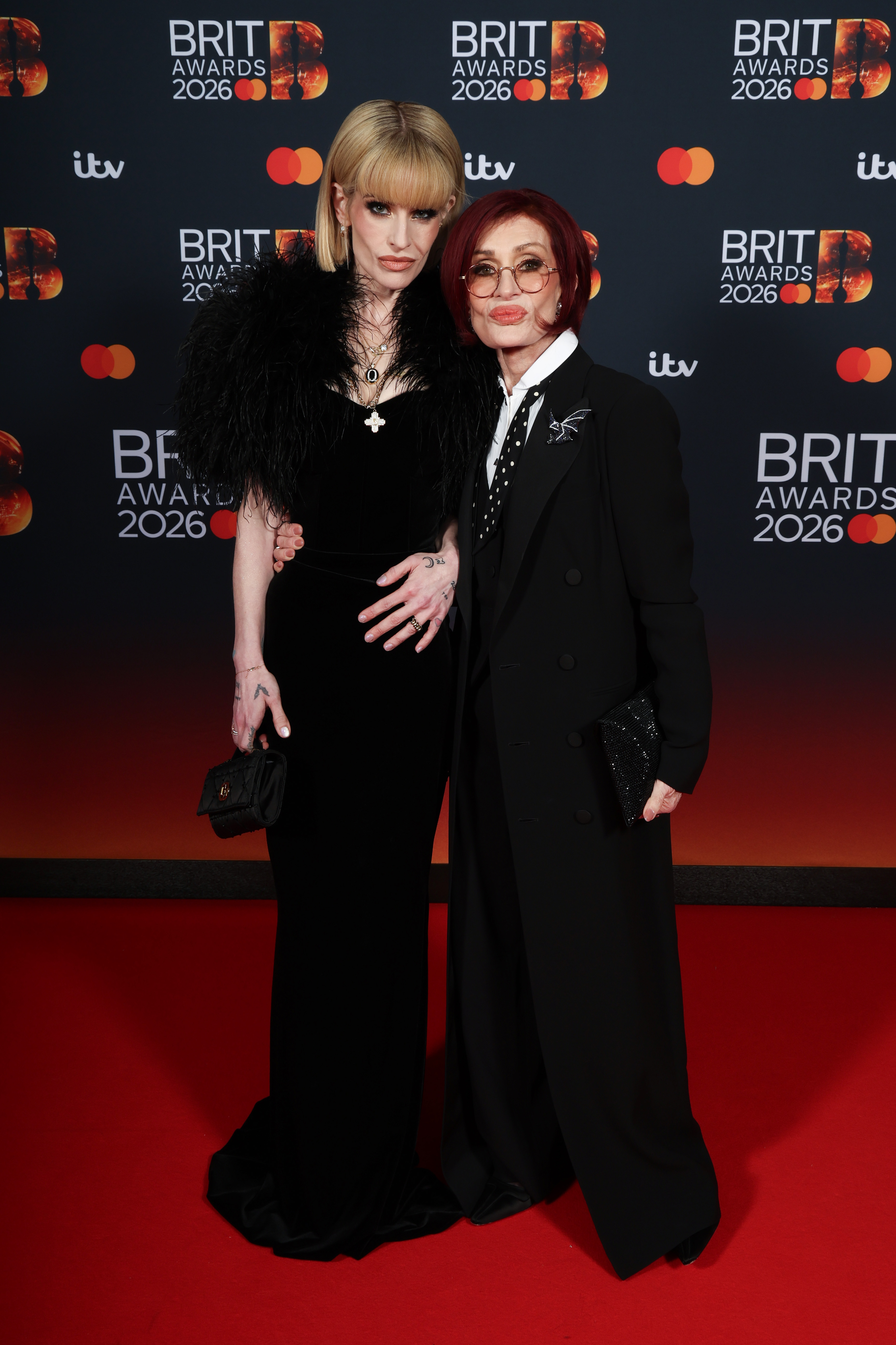 Kelly and Sharon Osbourne attend The BRIT Awards 2026 at Co-op Live on 28 February 2026 in Manchester, England. | Source: Getty Images
