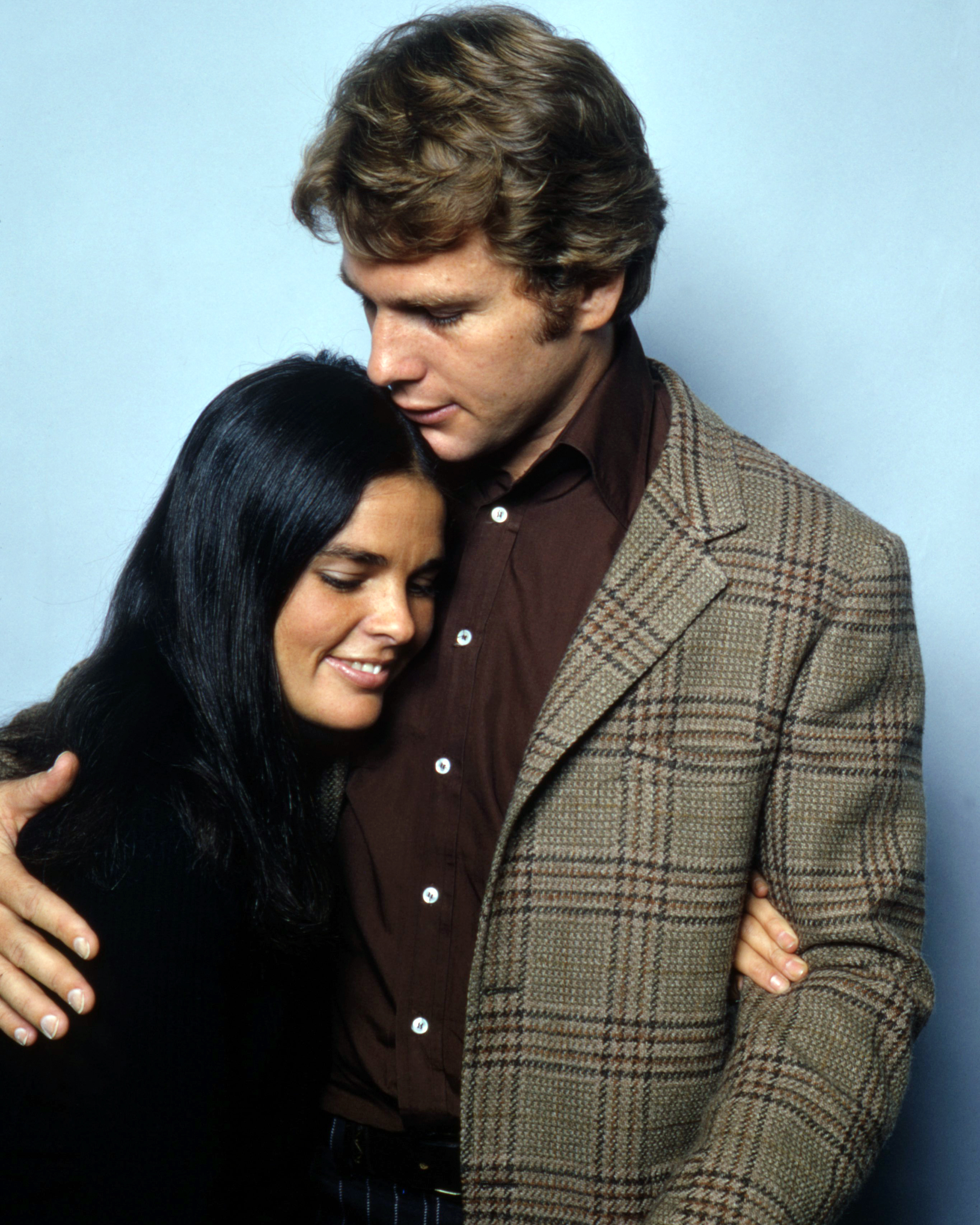 American actors Ryan O'Neal and Ali MacGraw in a promotional still for the 1970 film "Love Story." | Source: Getty Images