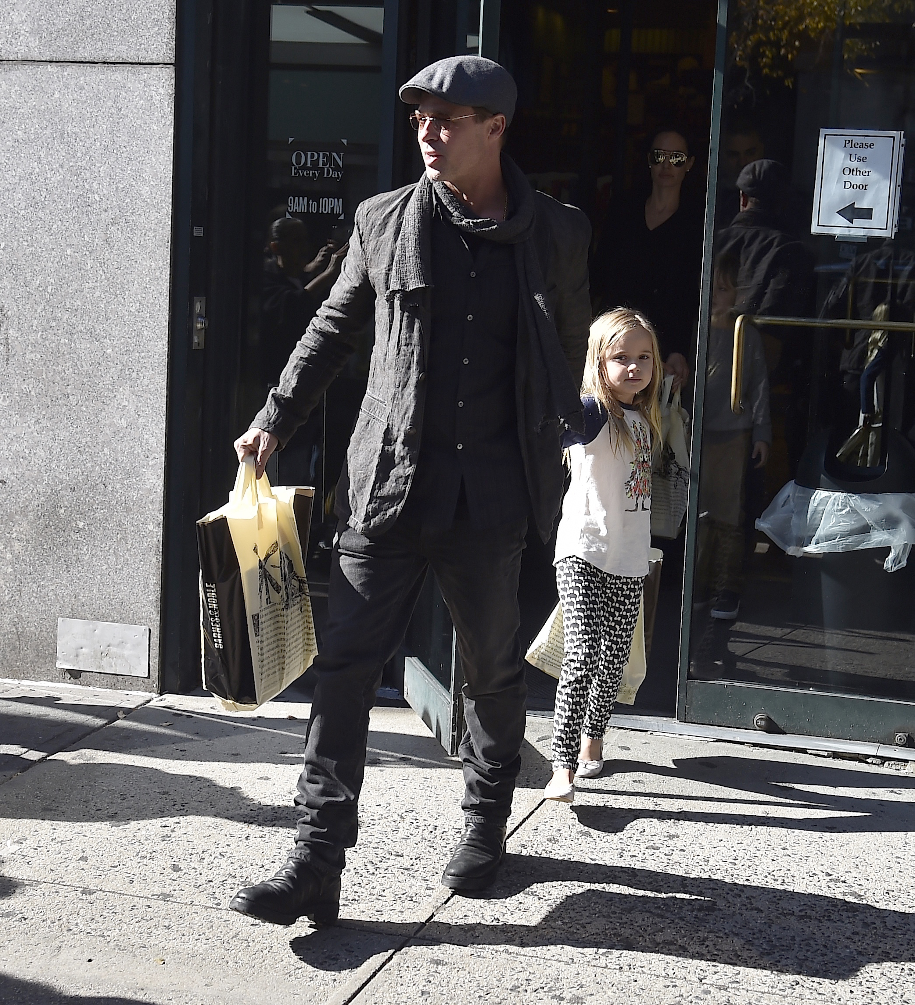 Brad Pitt and Vivienne Marcheline Jolie-Pitt are seen in the Upper West Side on November 3, 2015 in New York City | Source: Getty Images