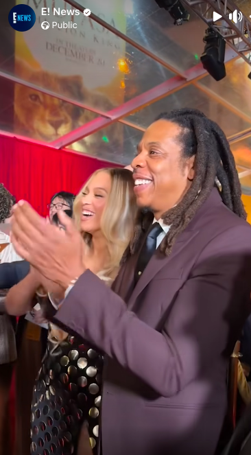 Beyoncé Knowles-Carter and Jay-Z Carter cheering for their daughter at the premiere, posted on December 10, 2024 | Source: Facebook/E! News