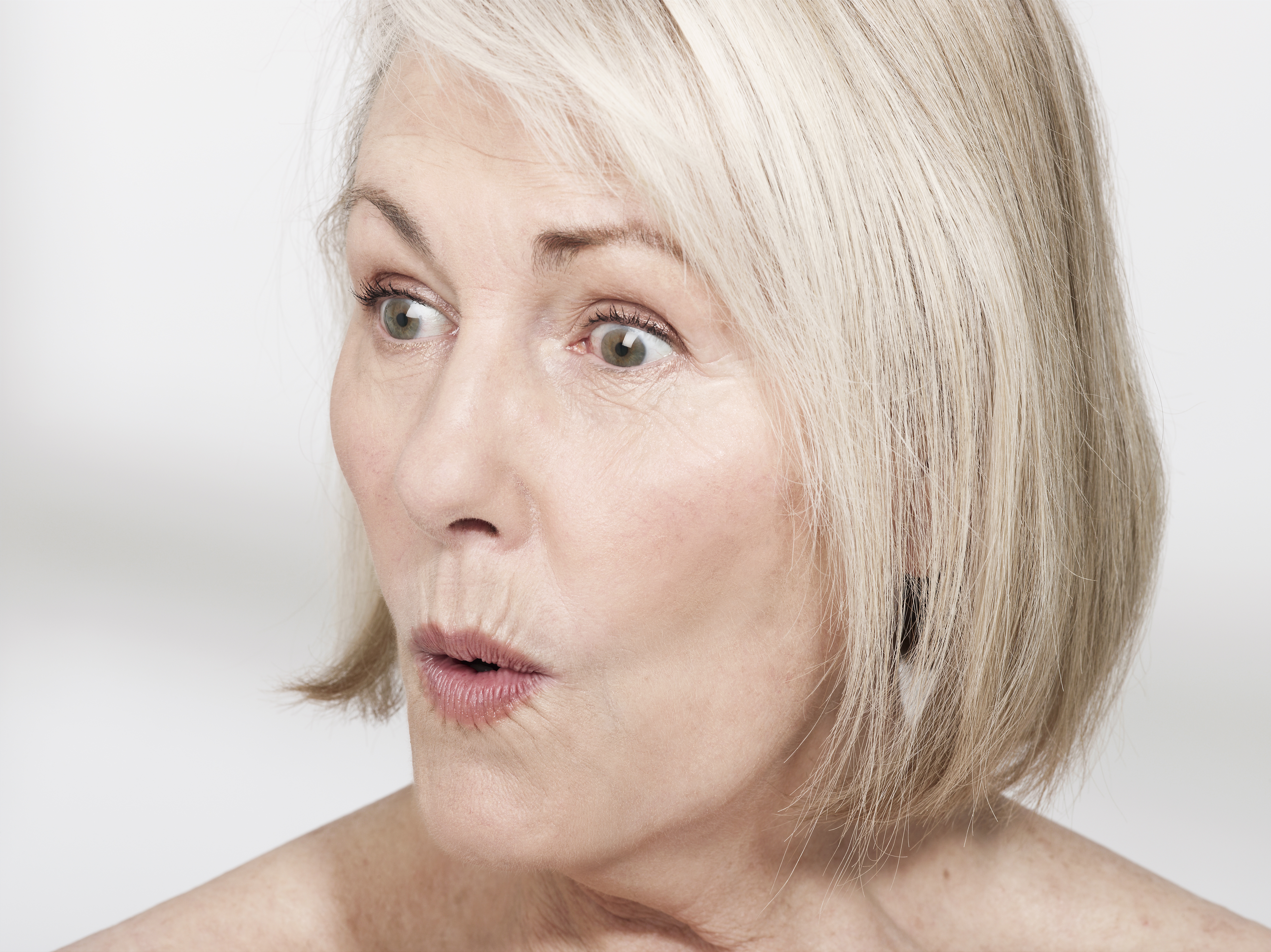 A close-up shot of a surprised senior woman | Source: Getty Images