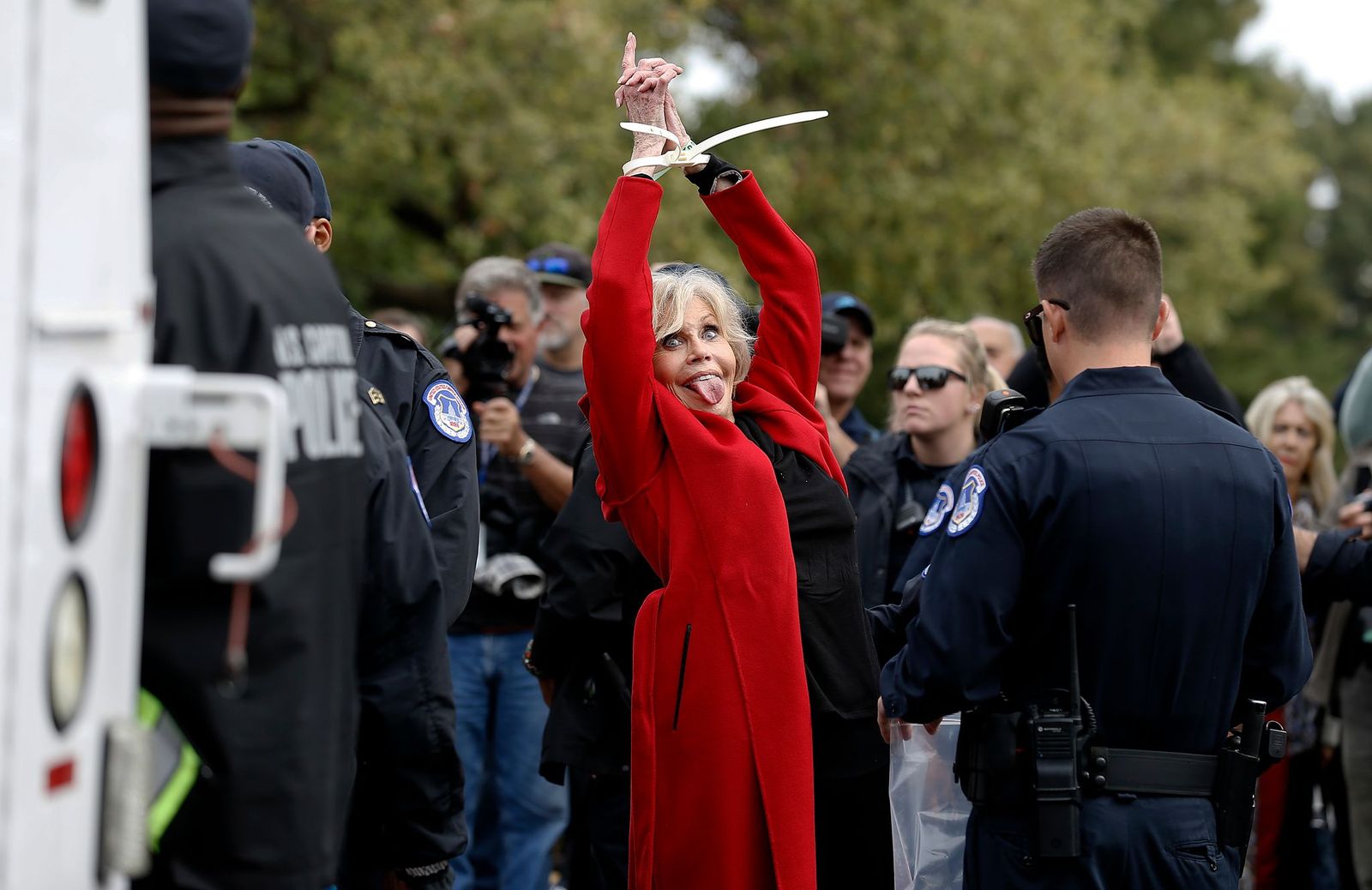 Jane Fonda getting arrested for the "Fire Drill Friday" protests. | Photo: Getty Images