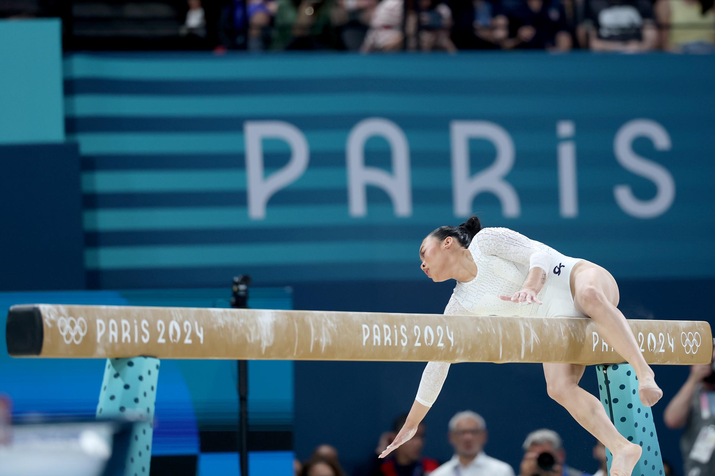 Suni Lee mid-fall on the balancing beam during the Women's Final at the Paris 2024 Olympics on August 5, in France. | Source: Getty Images