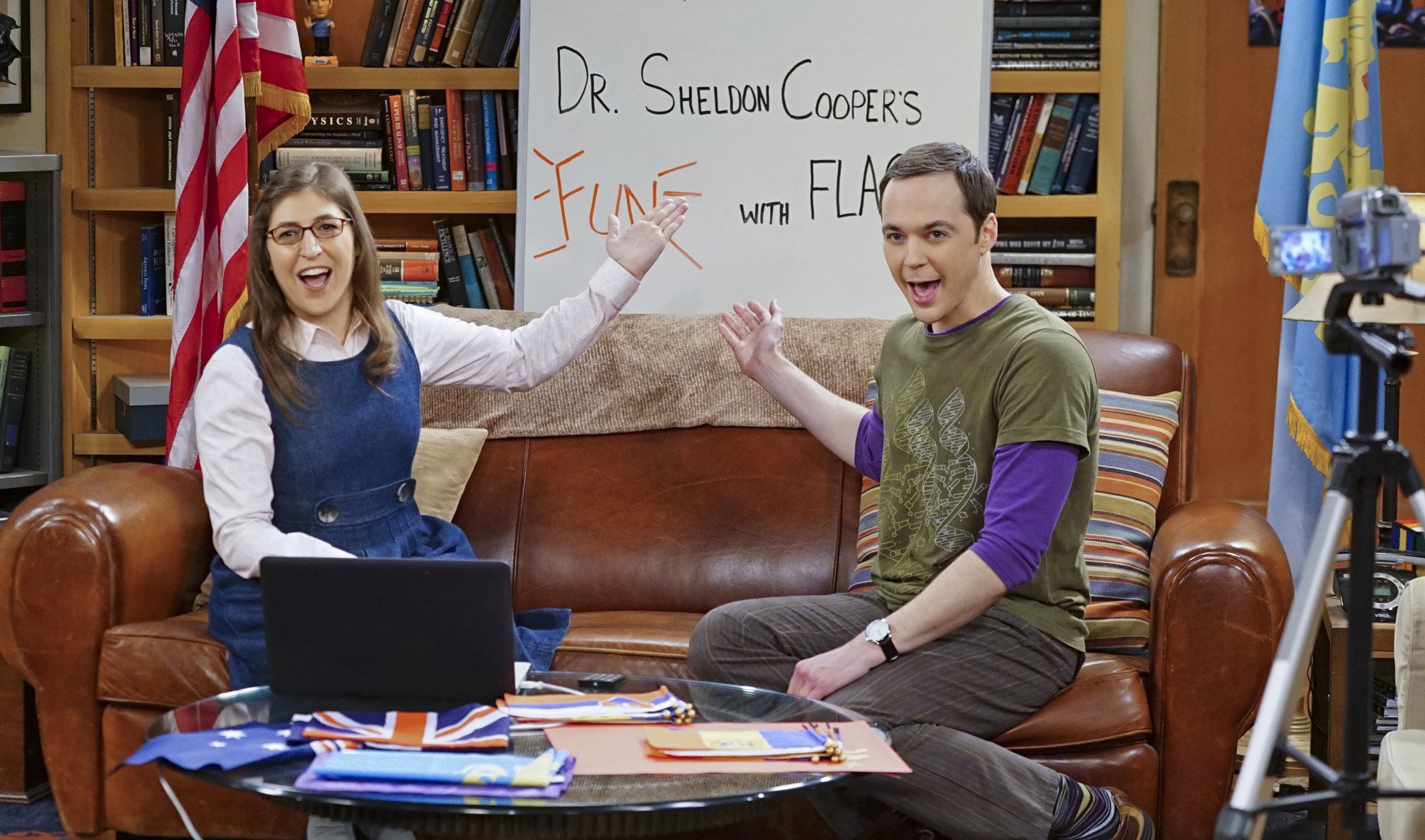  Sheldon (Jim Parsons, right) and Amy (Mayim Bialik, left) host a live Valentine's Day episode of Fun with Flags on "The Big Bang Theory." | Source: Getty Images.